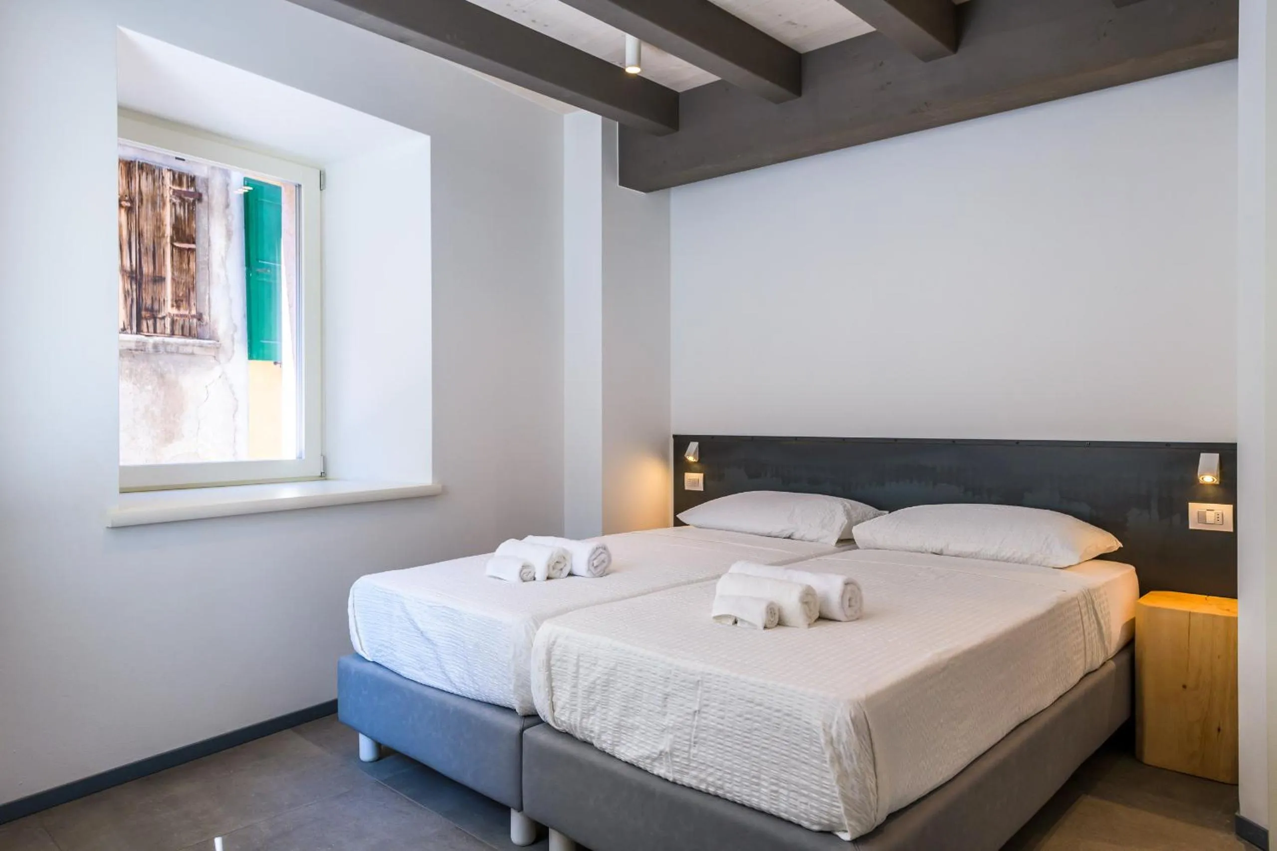 Bed in Casa Kaki - Eco friendly Apartments with Parking & Private Courtyard