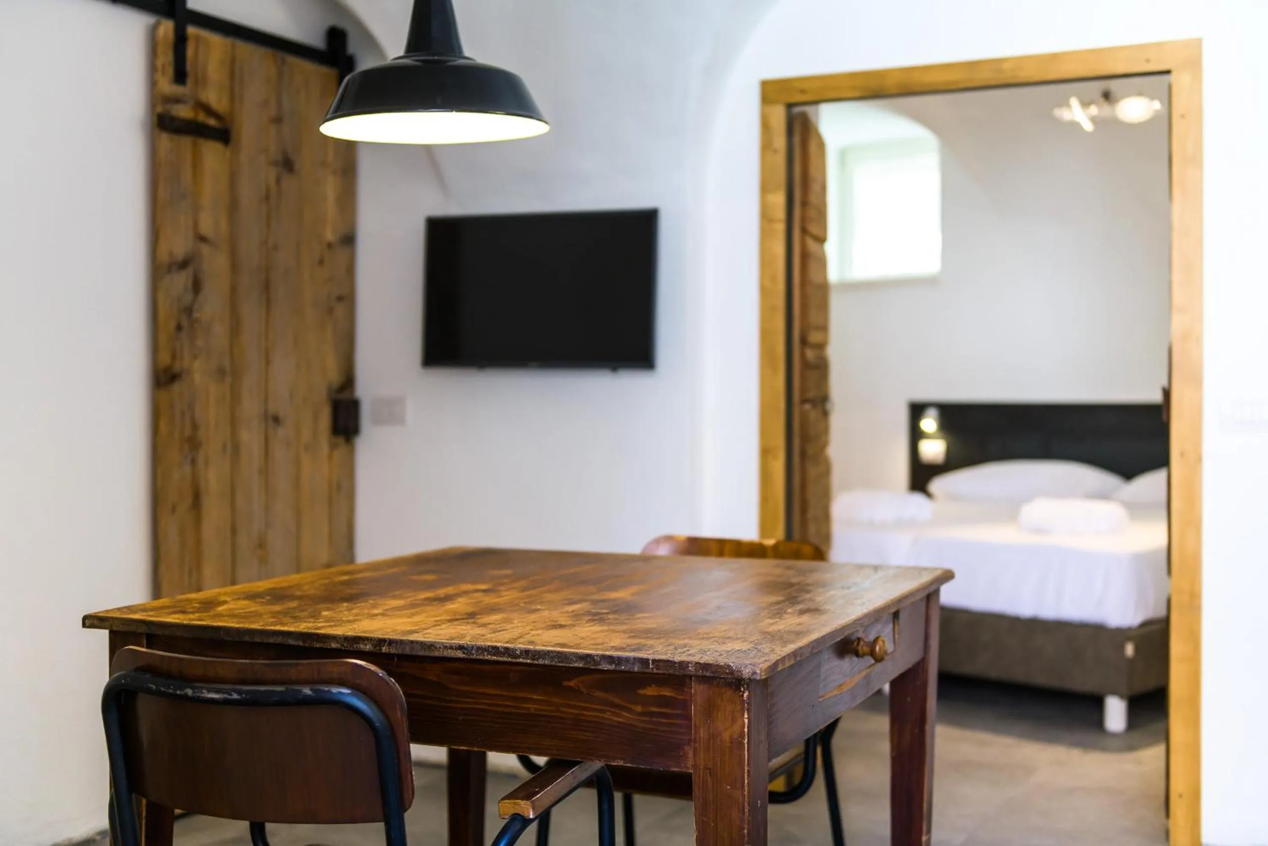 Kitchen or kitchenette, Bed in Casa Kaki - Eco friendly Apartments with Parking & Private Courtyard