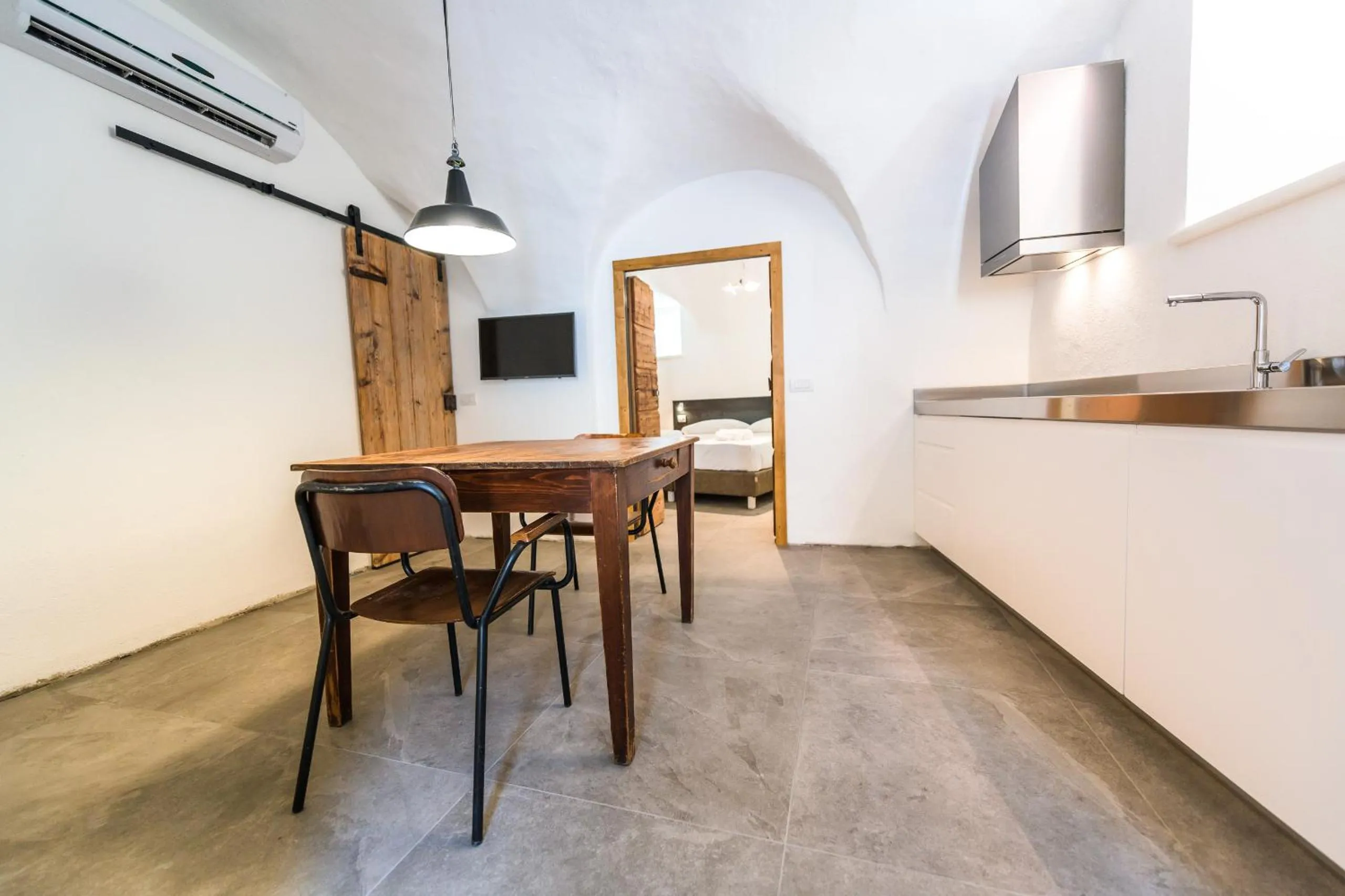 TV and multimedia in Casa Kaki - Eco friendly Apartments with Parking & Private Courtyard