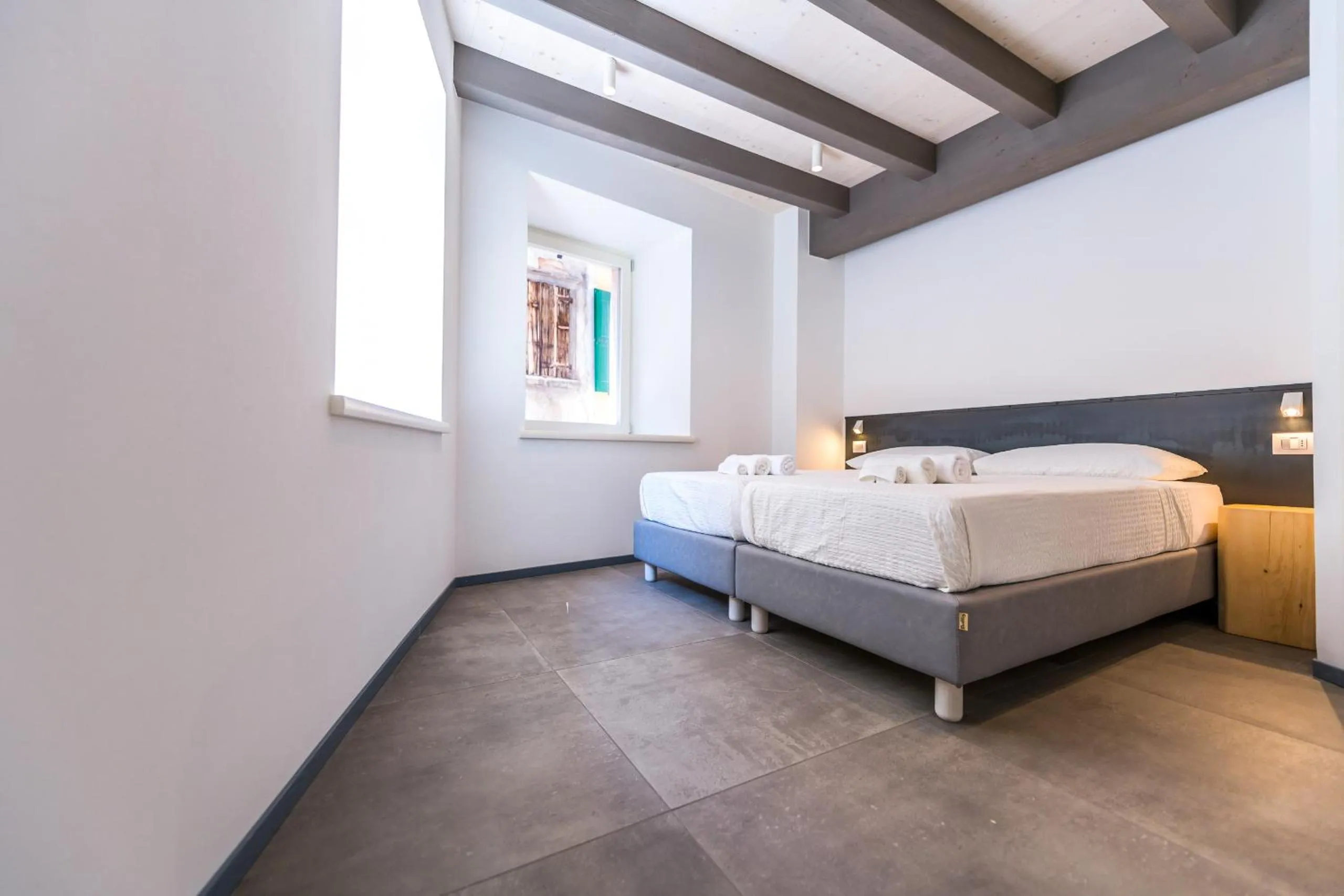 Bed in Casa Kaki - Eco friendly Apartments with Parking & Private Courtyard