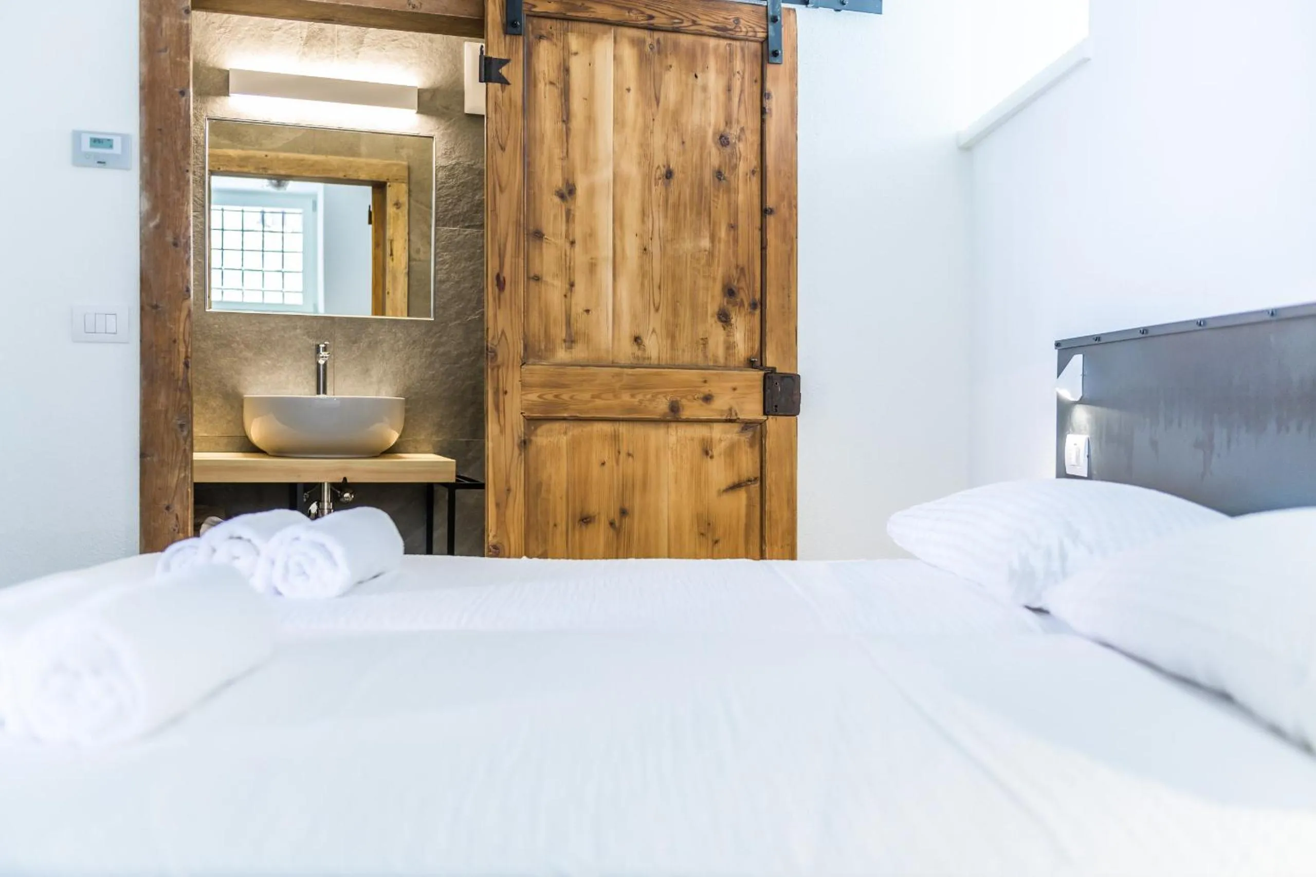 Photo of the whole room, Bed in Casa Kaki - Eco friendly Apartments with Parking & Private Courtyard