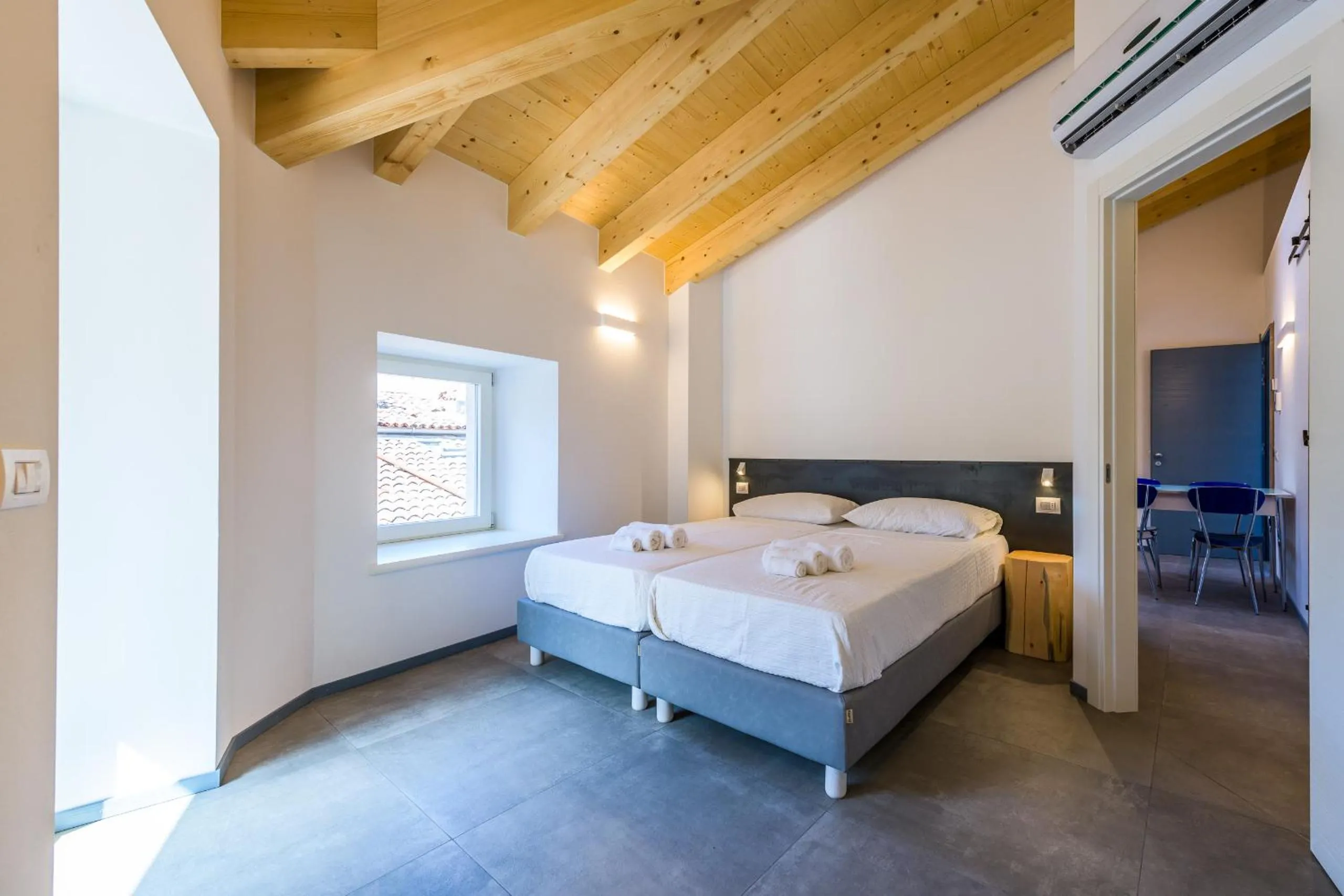 Bed in Casa Kaki - Eco friendly Apartments with Parking & Private Courtyard