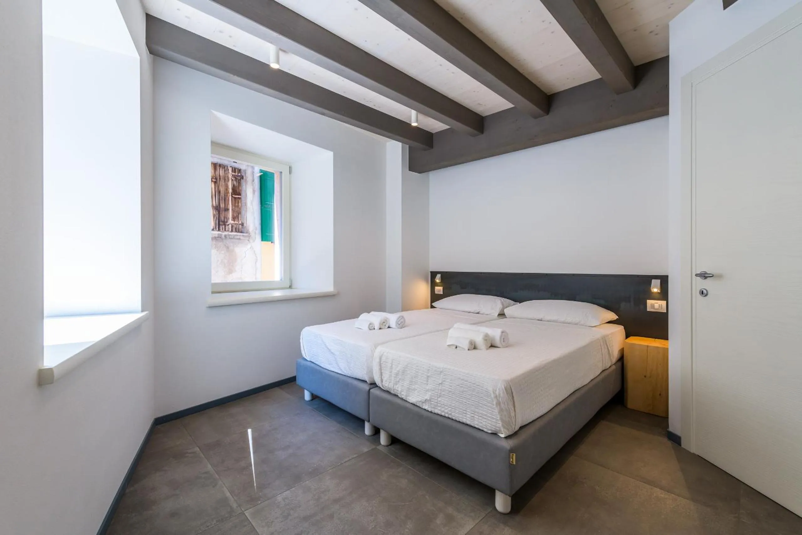 Bed in Casa Kaki - Eco friendly Apartments with Parking & Private Courtyard