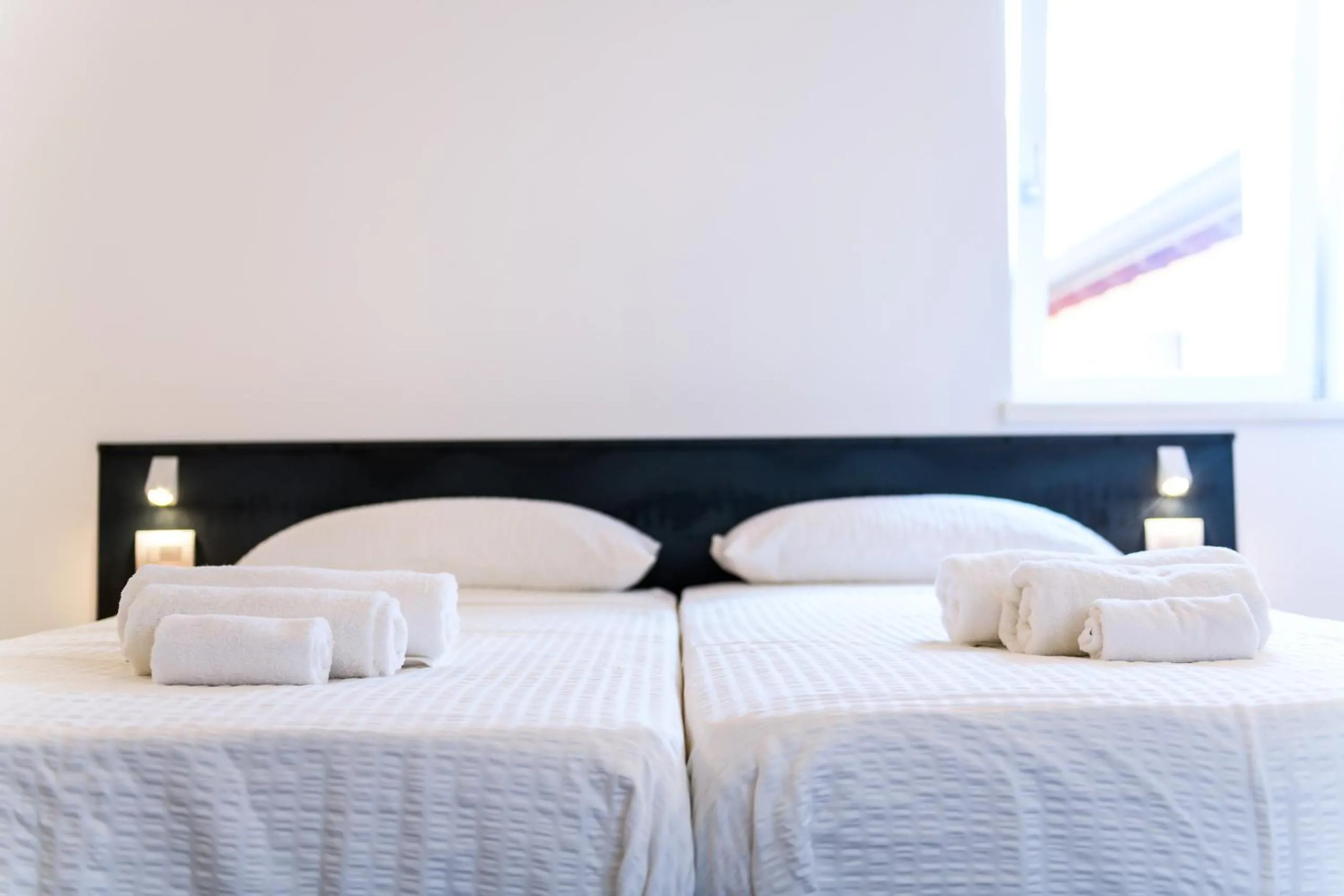 Bed in Casa Kaki - Eco friendly Apartments with Parking & Private Courtyard