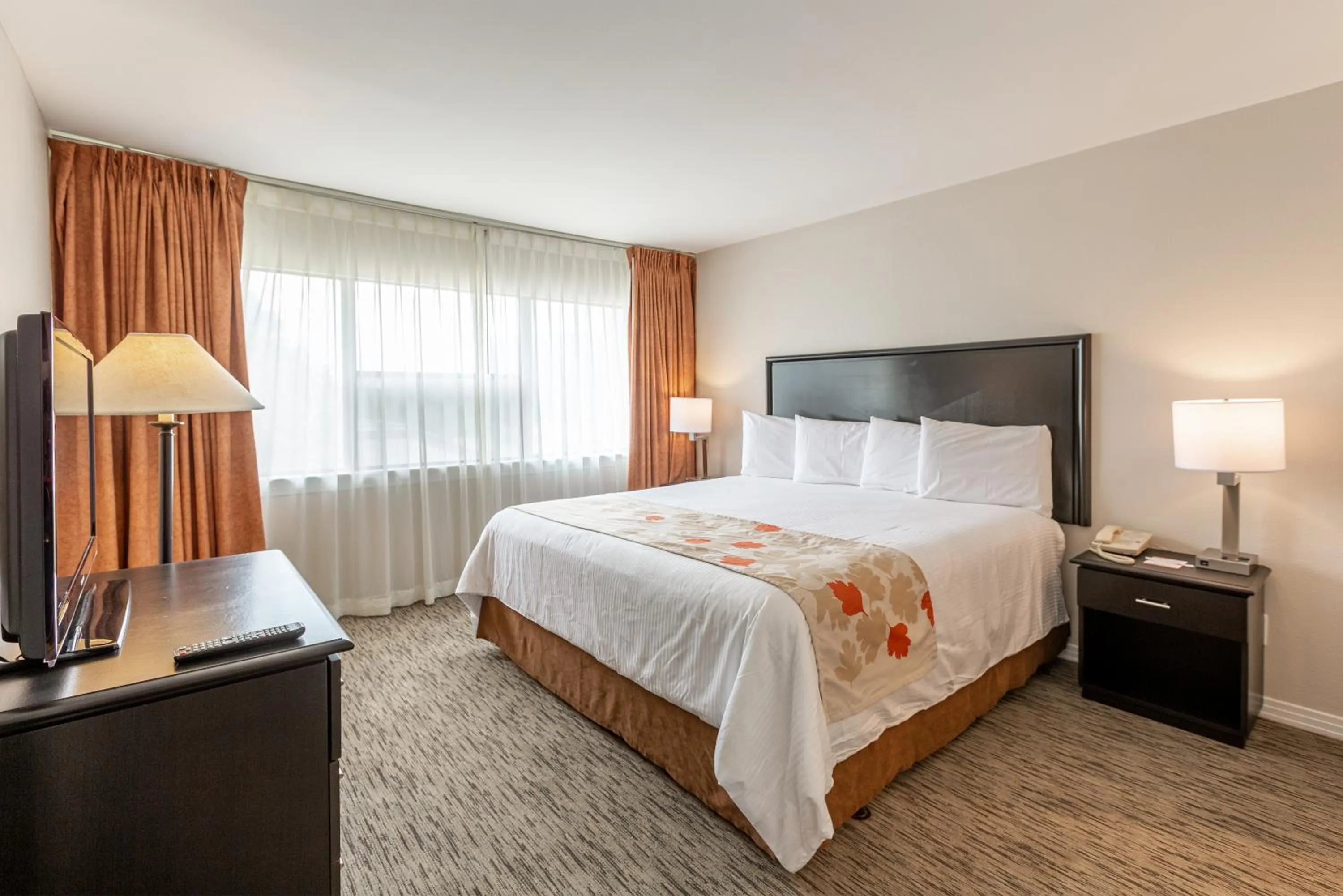 Bedroom, Bed in Value Suites Extended Stay - Arlington