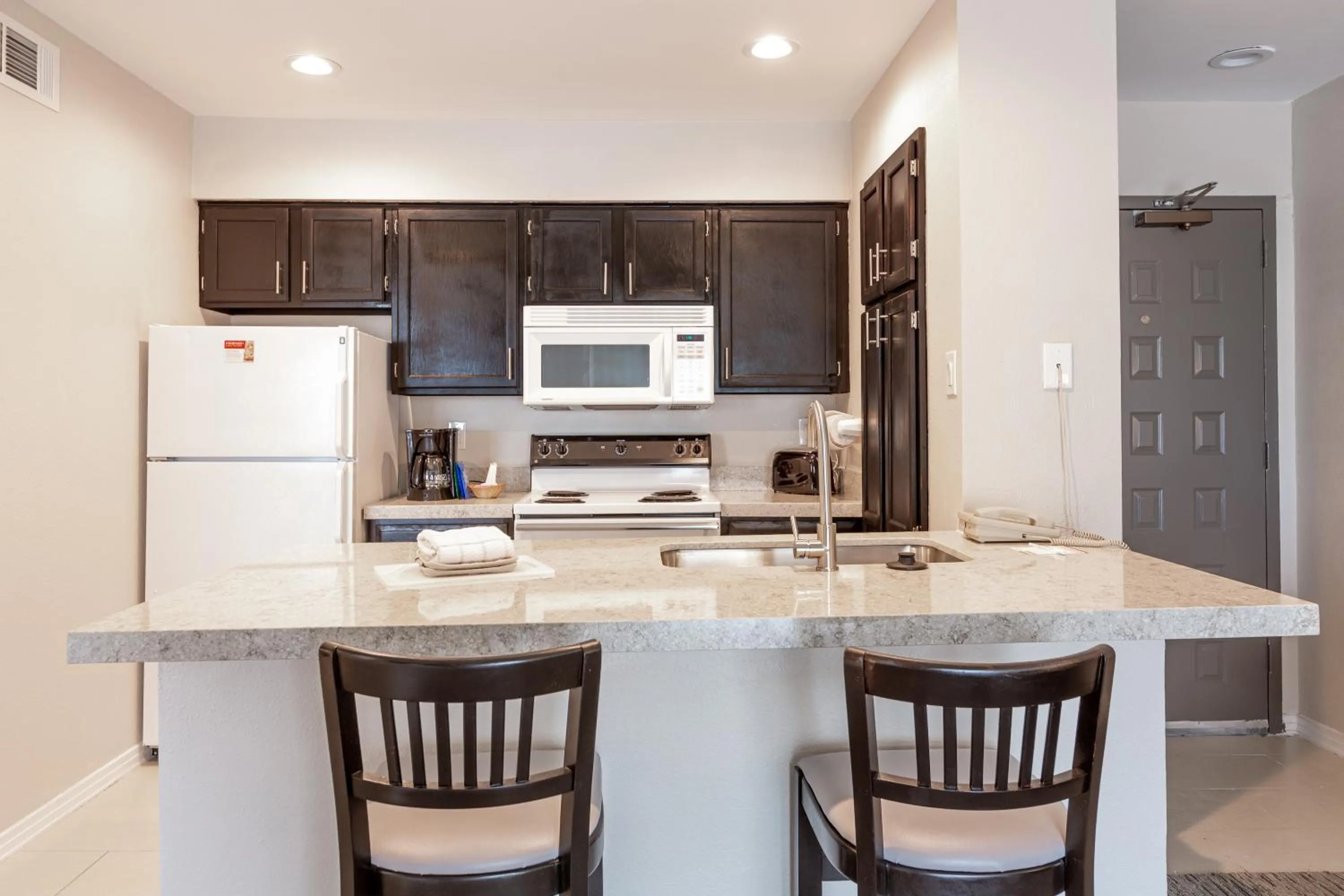 Kitchen or kitchenette in Value Suites Extended Stay - Arlington