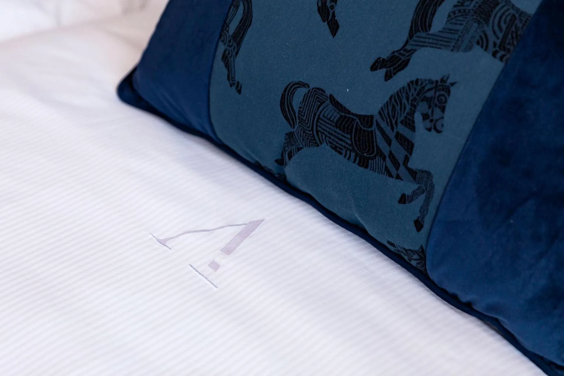 Bed in Amadomus Luxury Suites