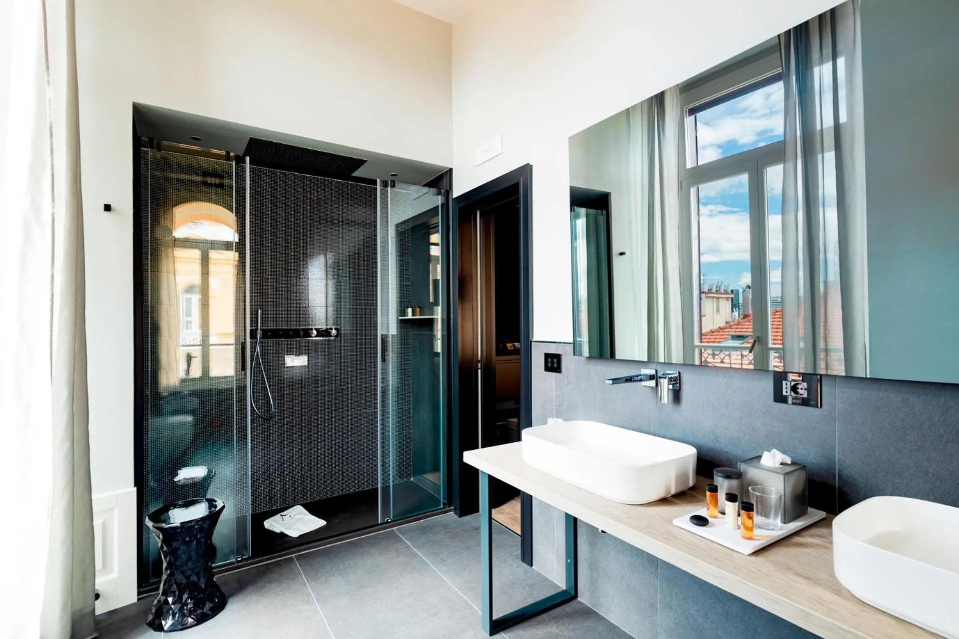 Shower in Amadomus Luxury Suites