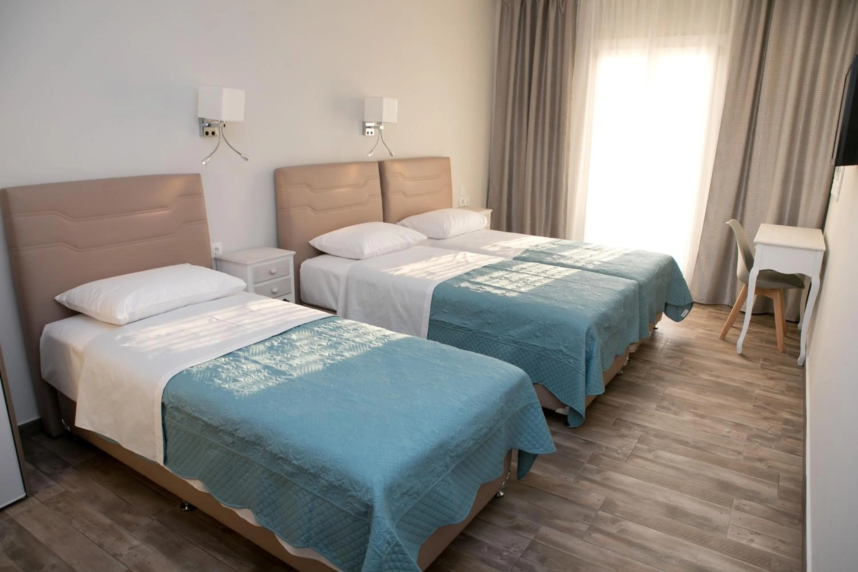 Bed in Hyperion Hotel