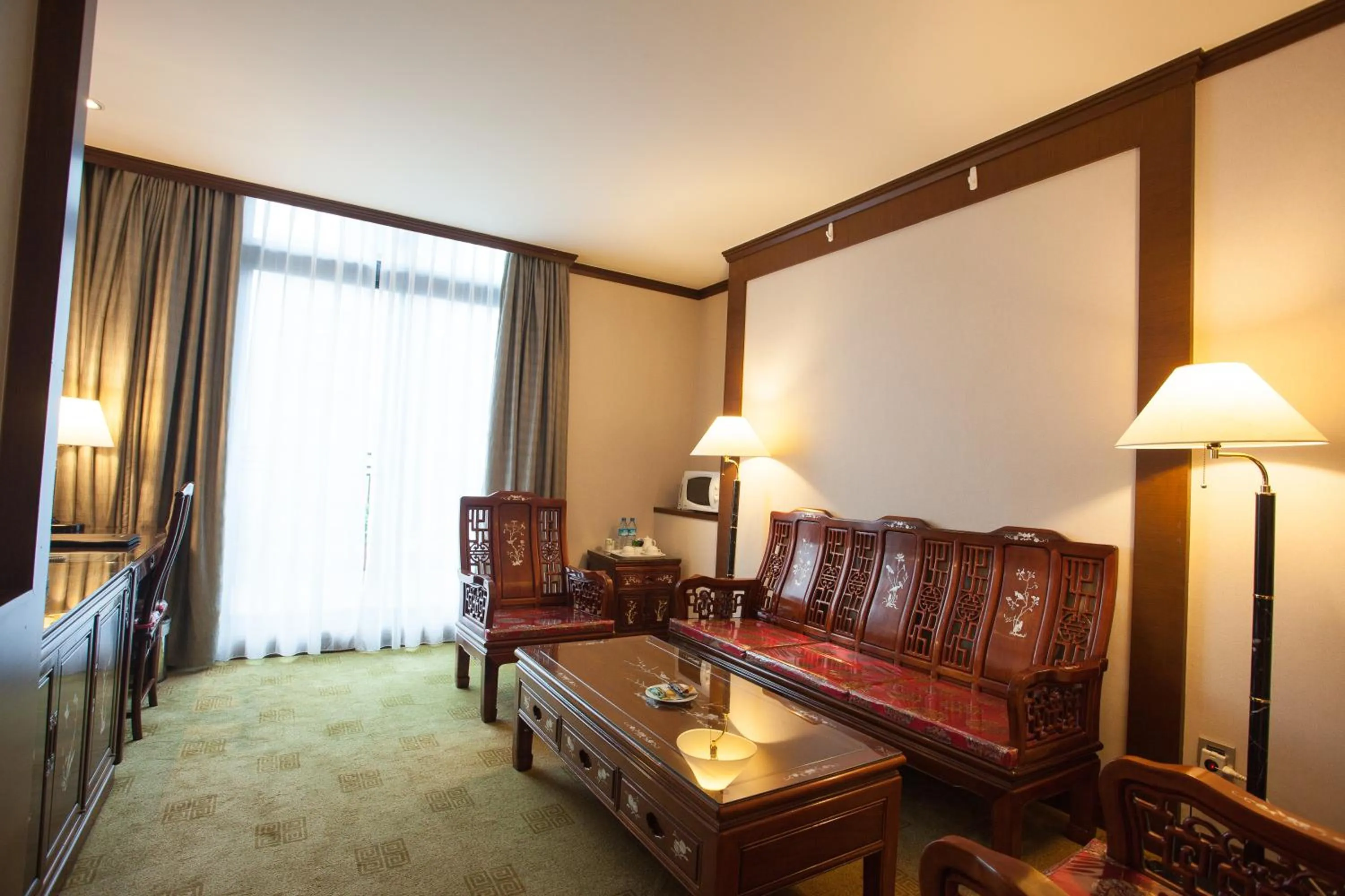 Living room in Rich Garden Hotel