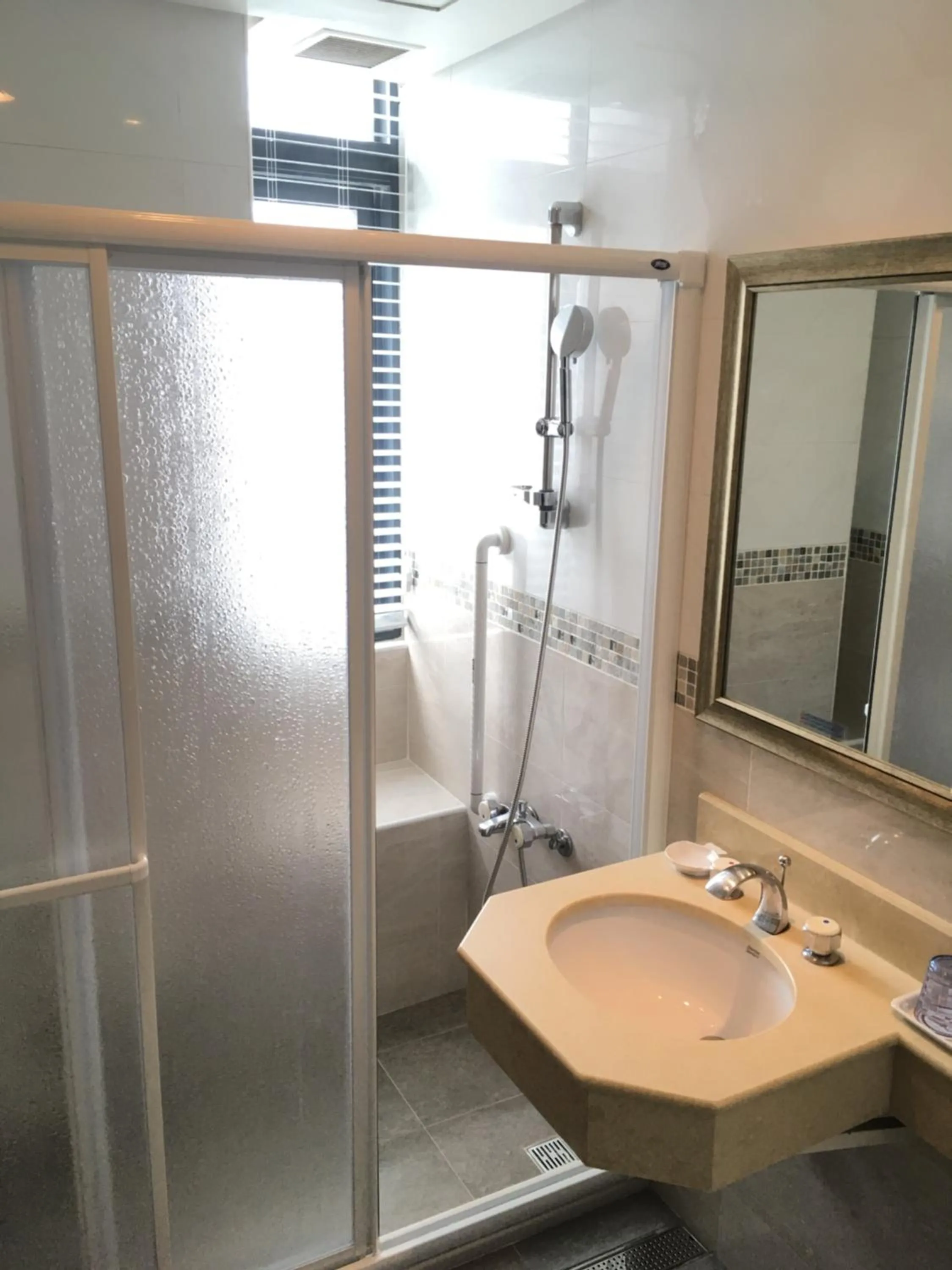 Shower in Rich Garden Hotel