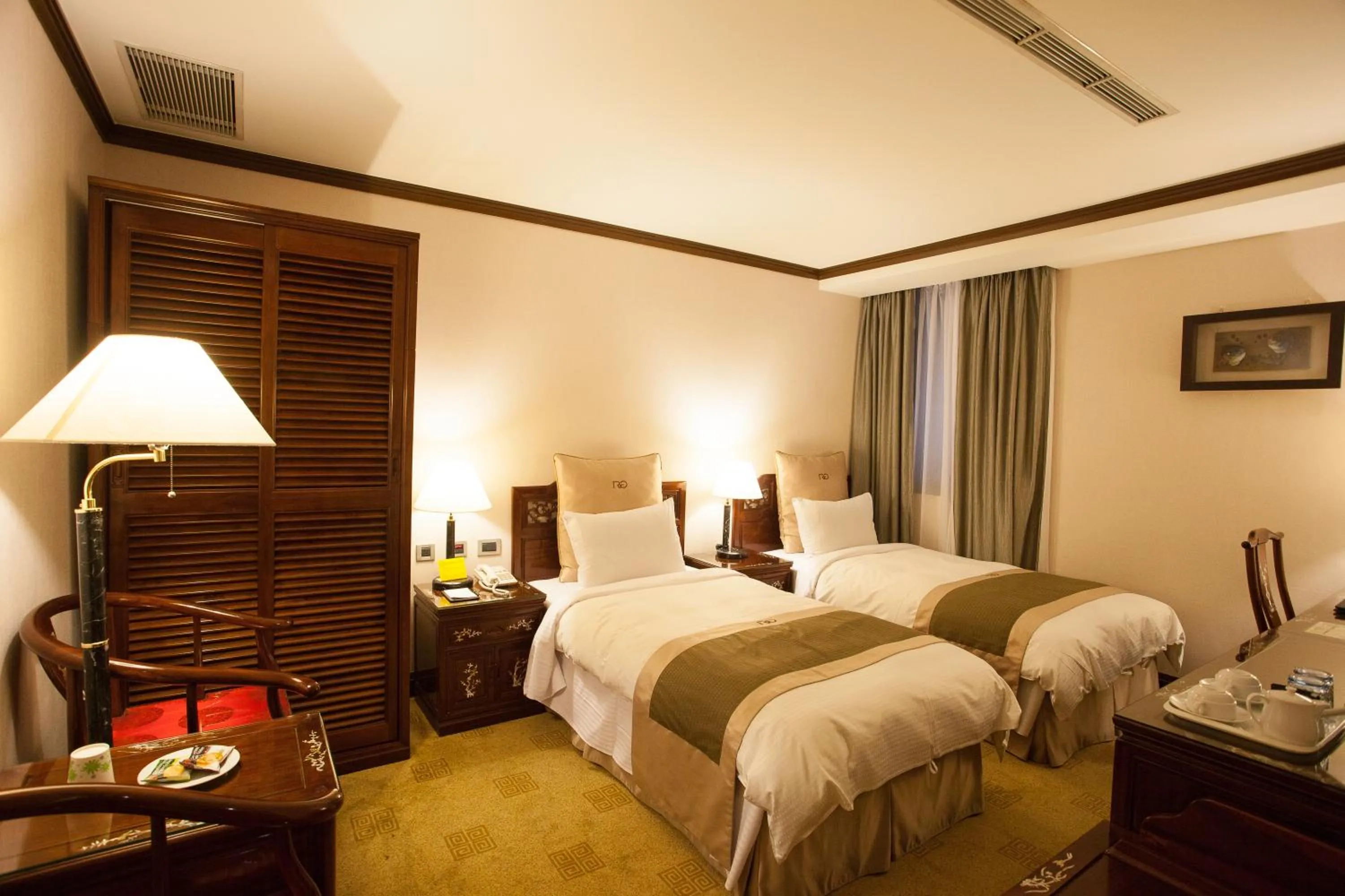 Photo of the whole room, Bed in Rich Garden Hotel