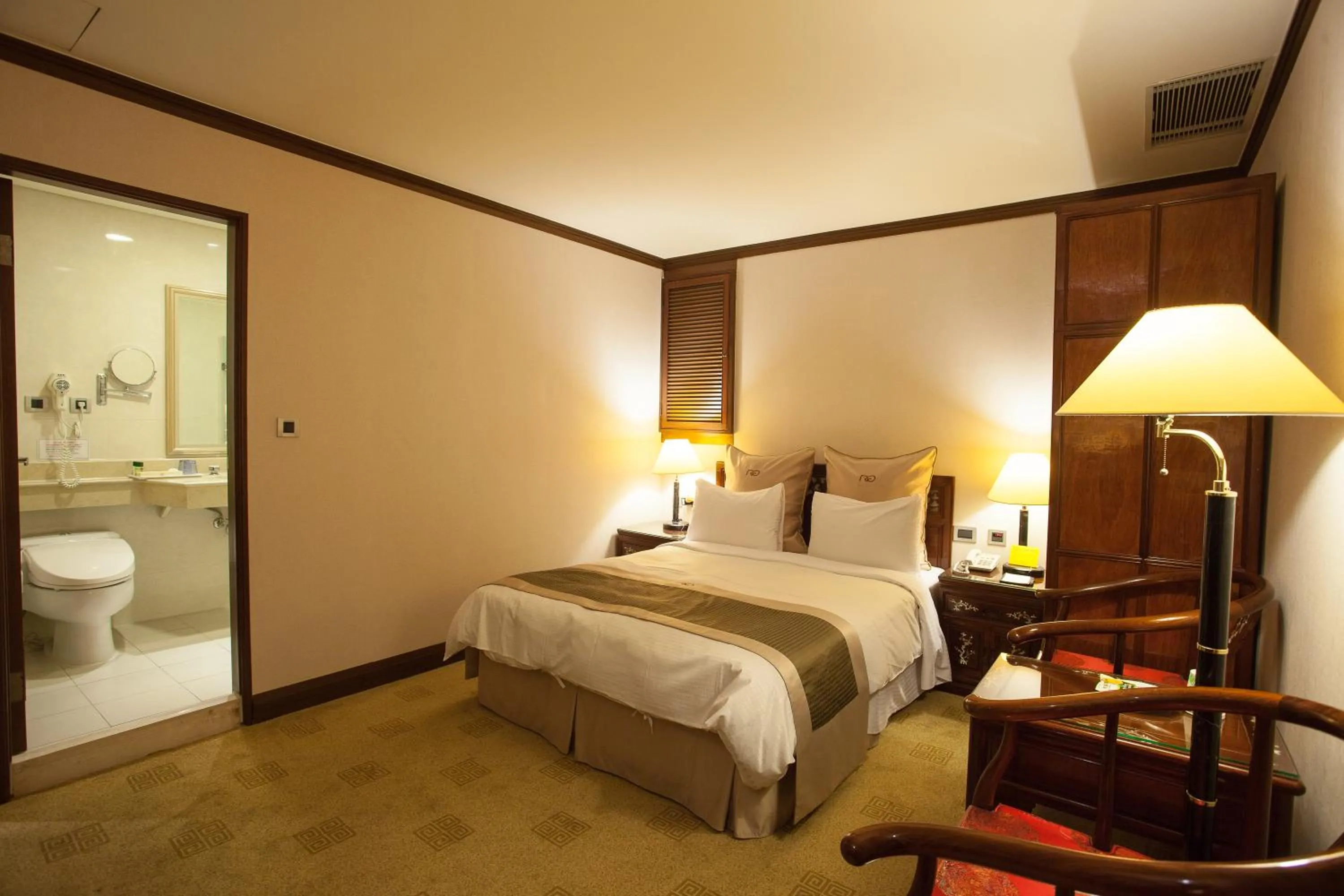 Photo of the whole room, Bed in Rich Garden Hotel