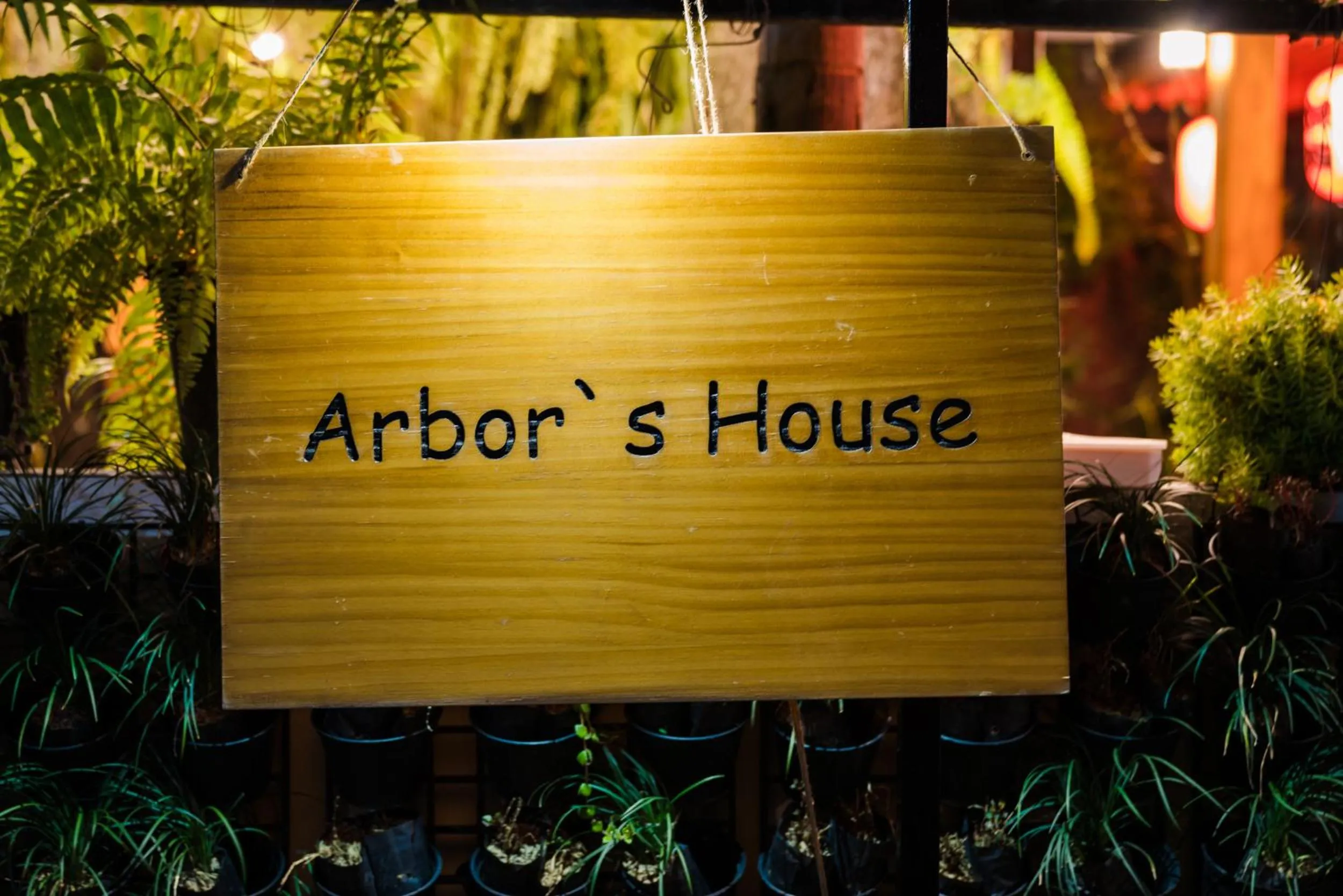 Property logo or sign in Arbor's house