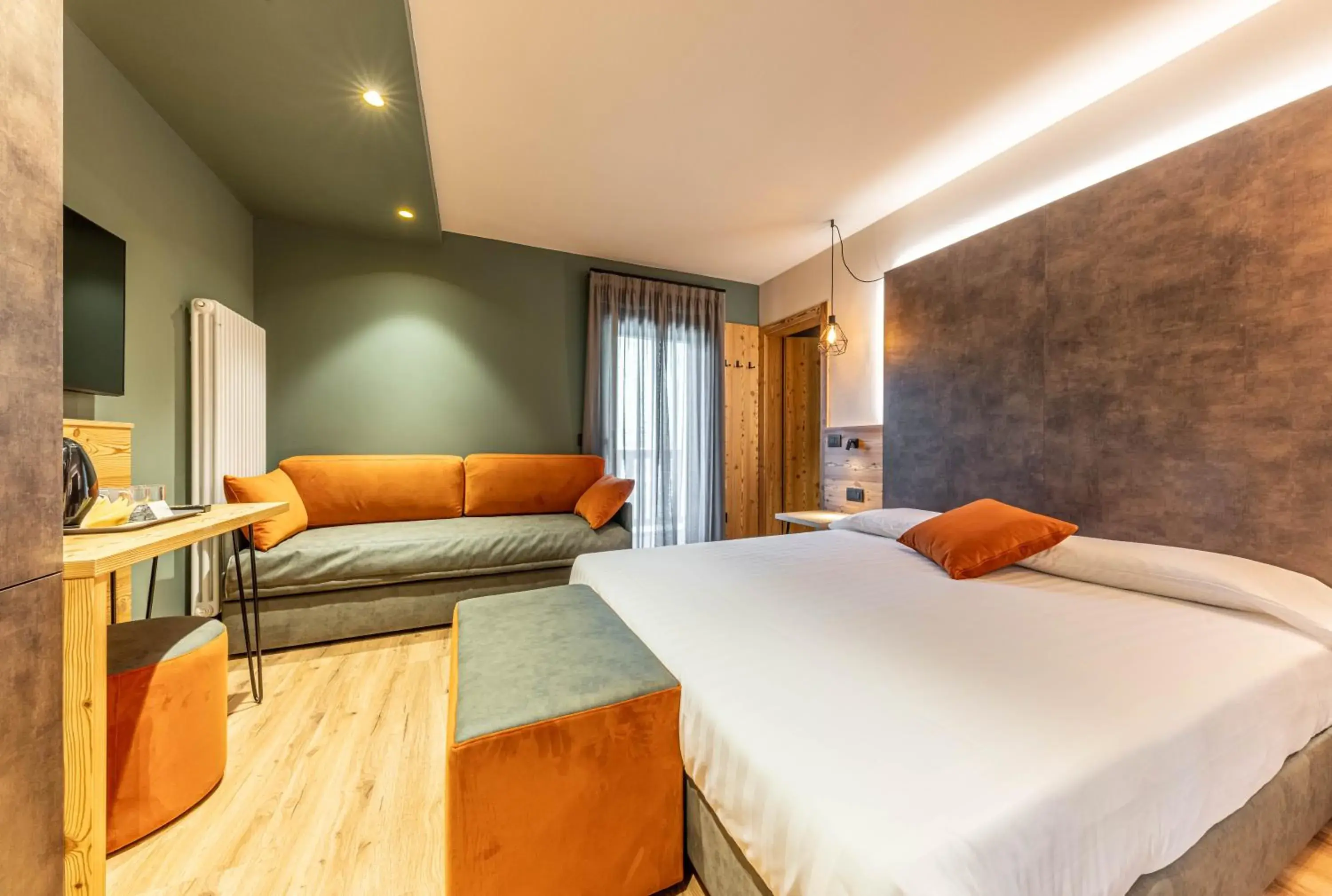 Comfort Quadruple Room in Hotel Laste' Comfort Quadruple Room in Hotel Laste'