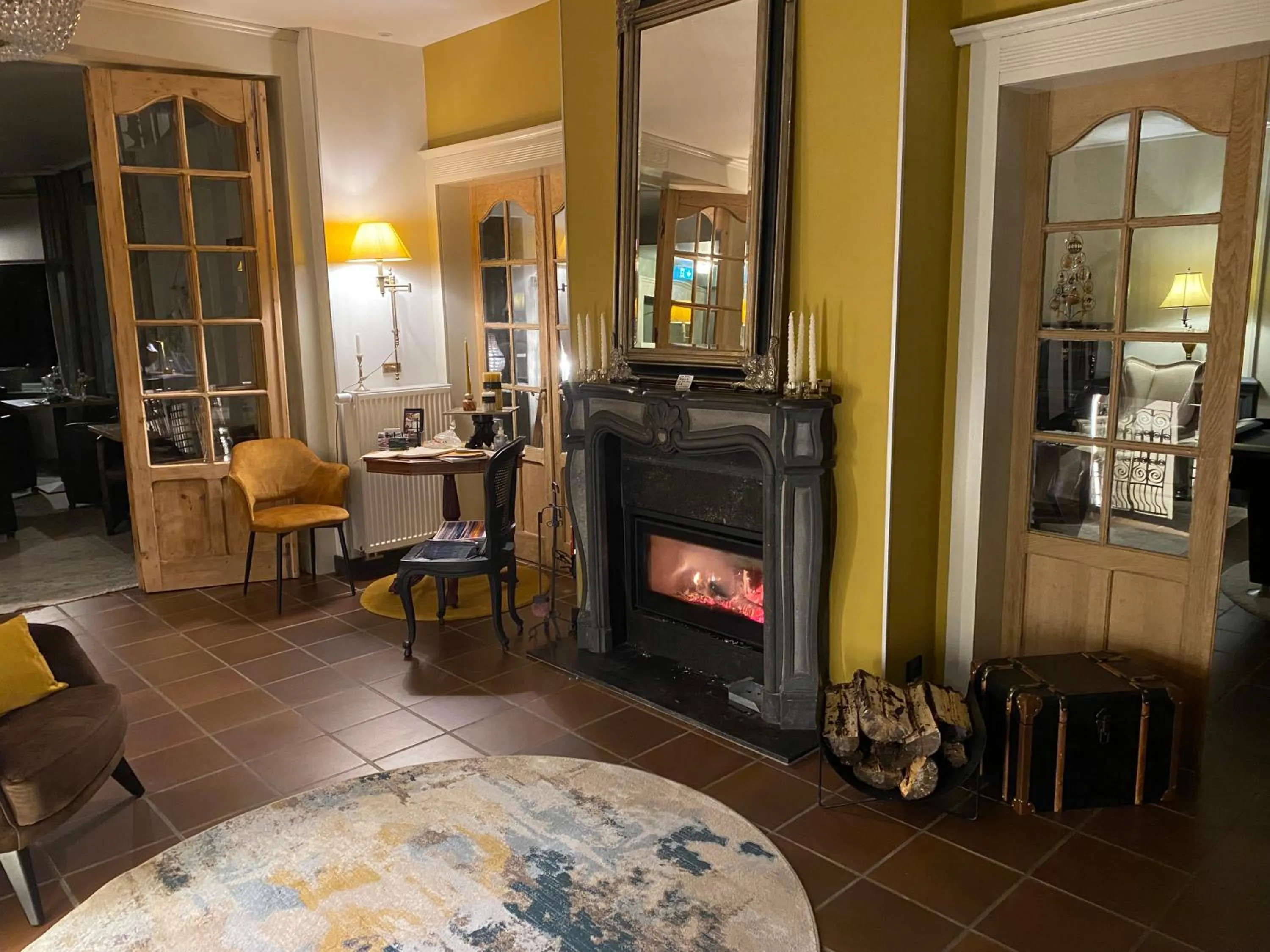 Lobby or reception in Au Petit Manoir