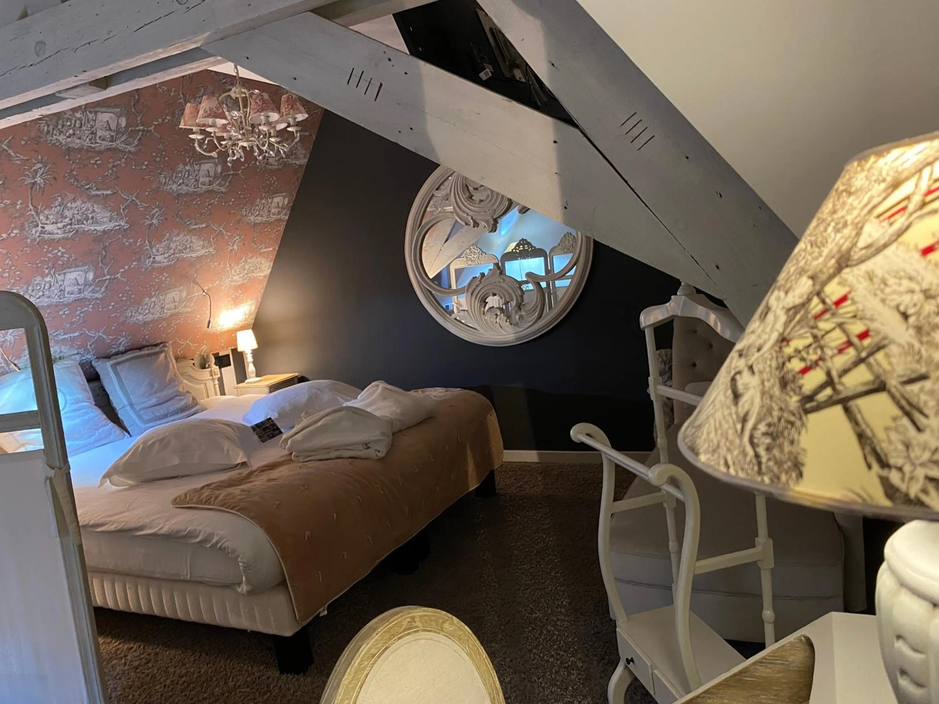 Bed in Au Petit Manoir