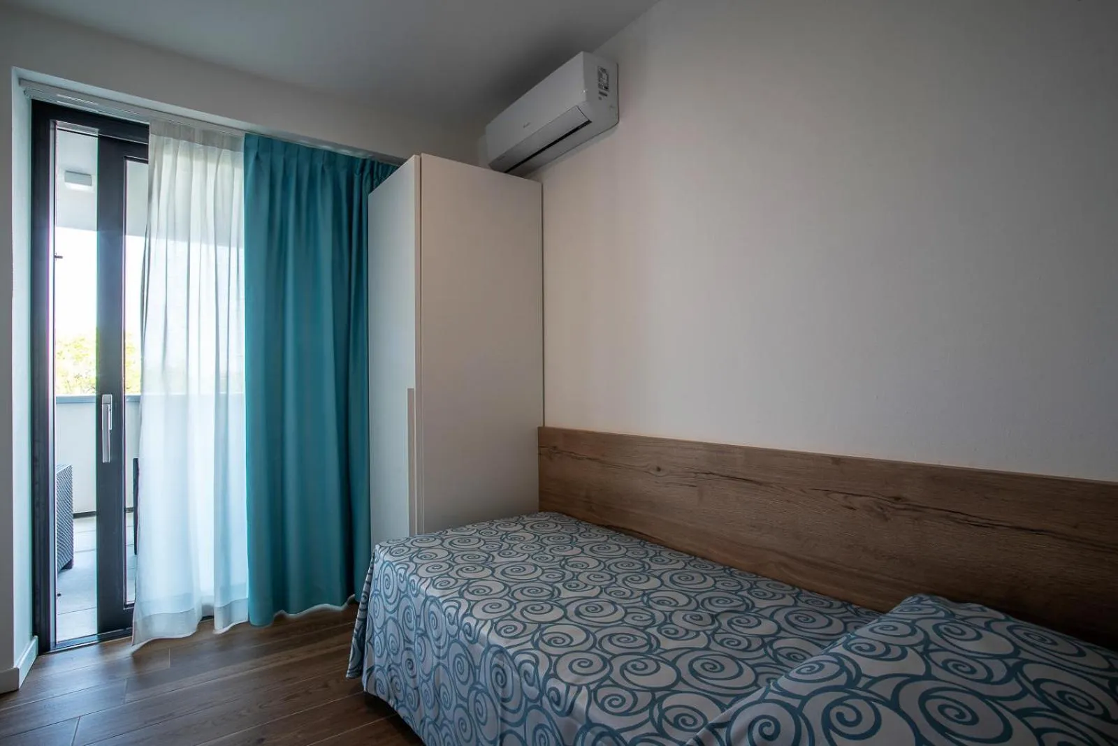 Bedroom in Aparthotel Miramare