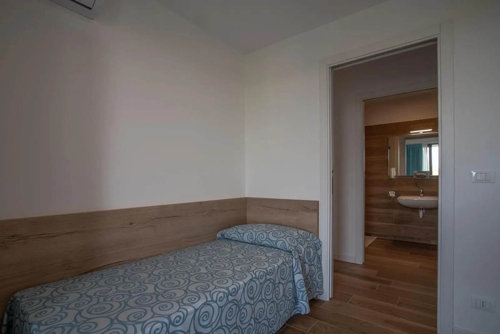 Bedroom in Aparthotel Miramare