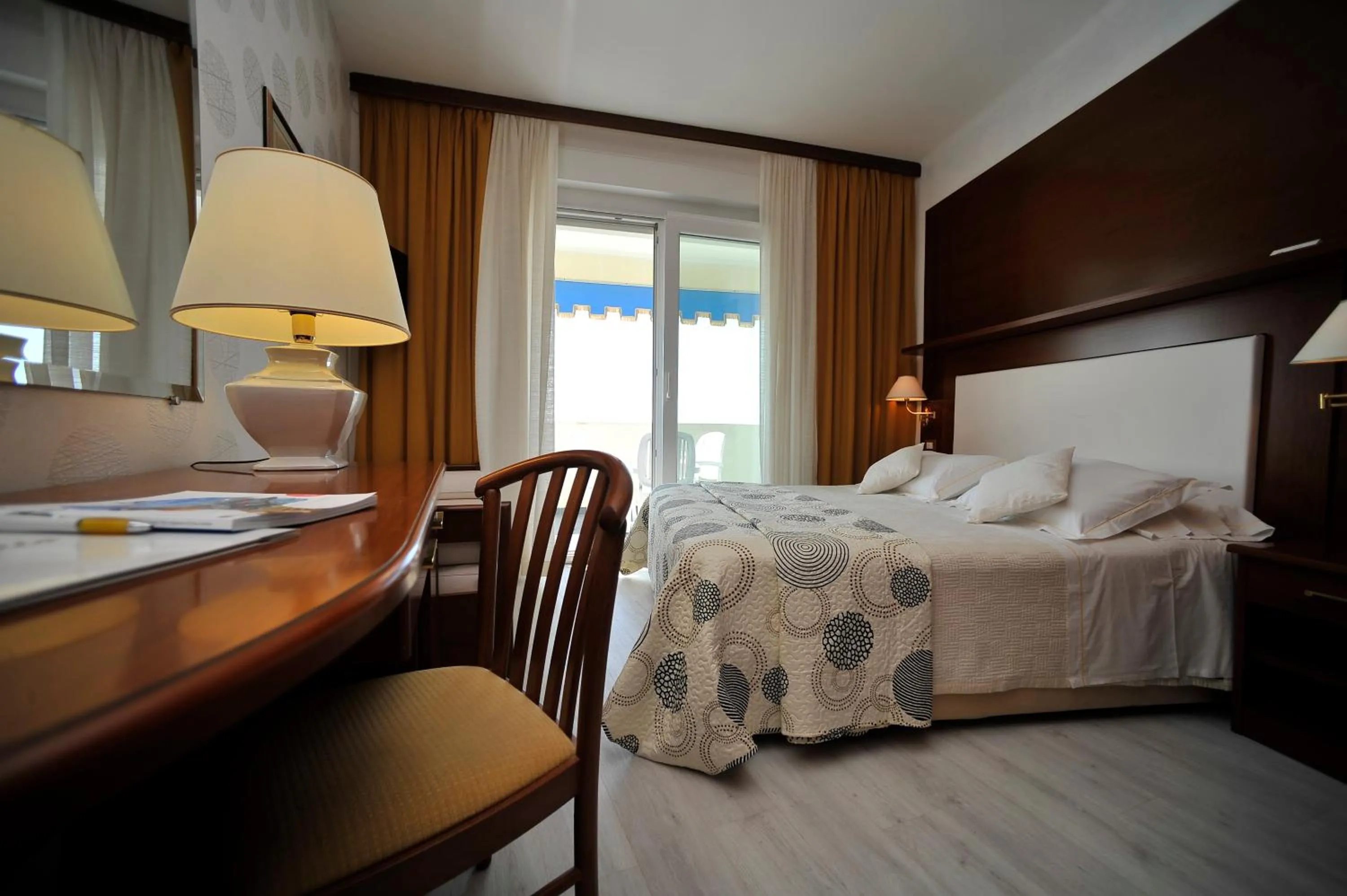 Bed in Hotel Corallo