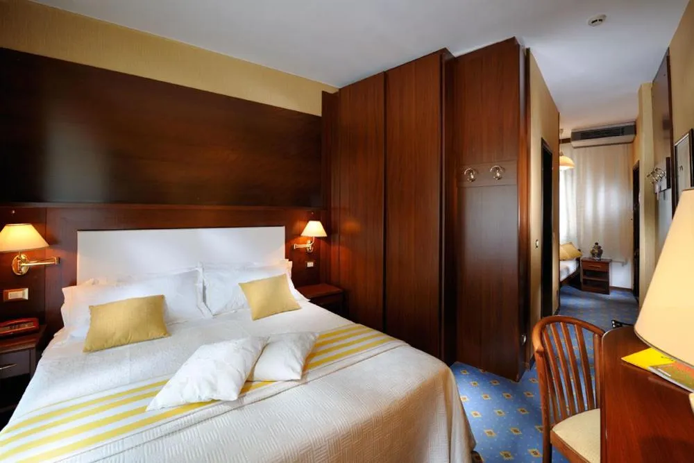 Bed in Hotel Corallo