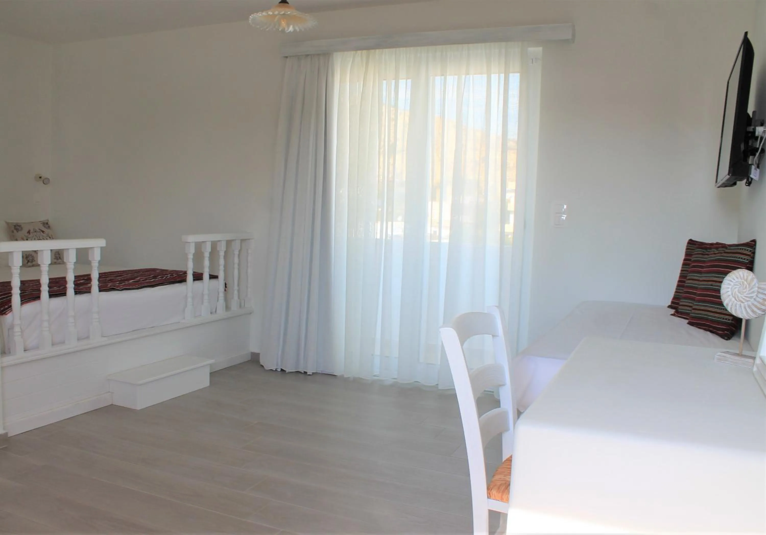 Photo of the whole room, Bed in Stegna Akti Luxury Suites