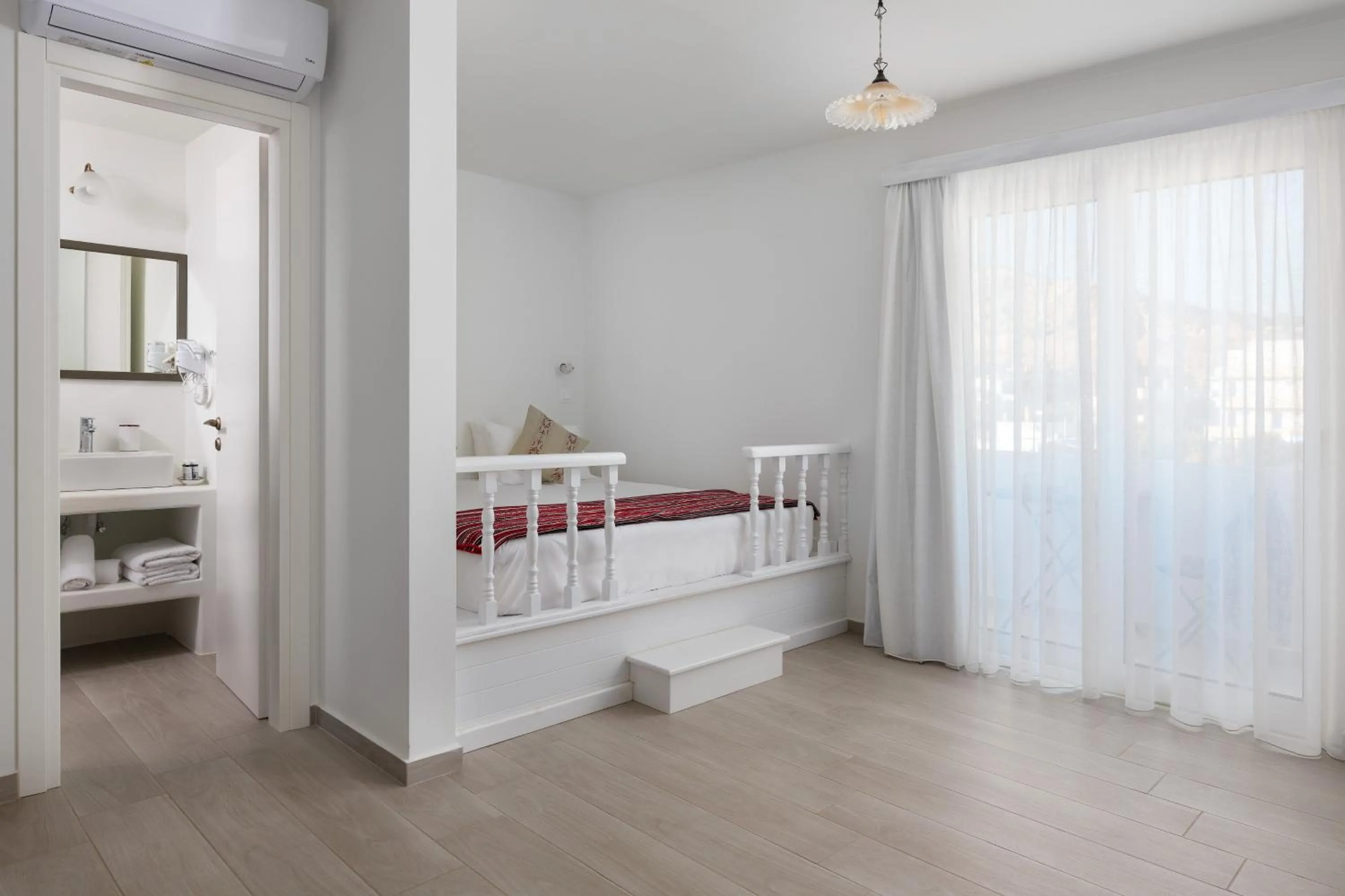 Bed in Stegna Akti Luxury Suites