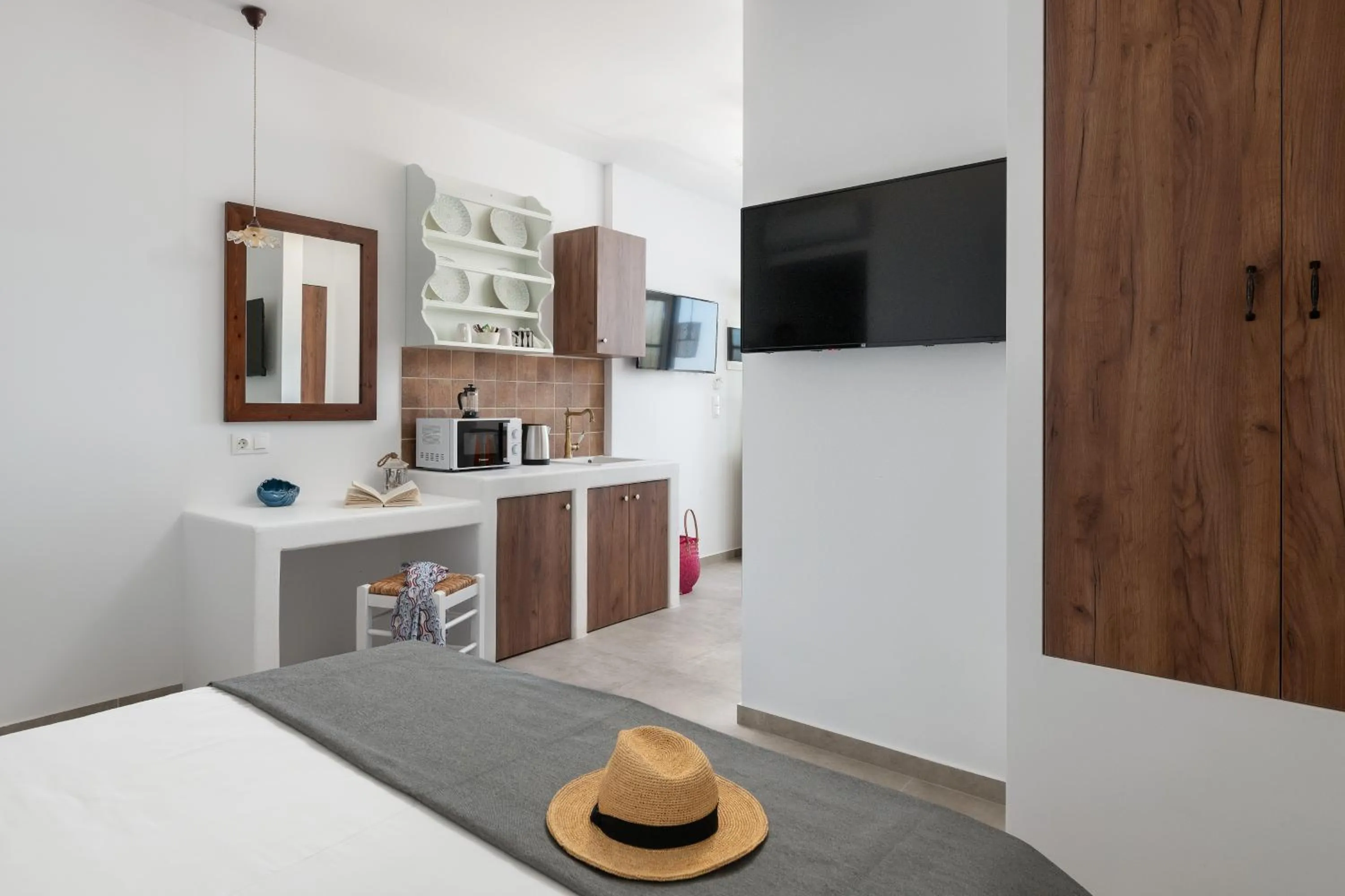 Bed in Stegna Akti Luxury Suites