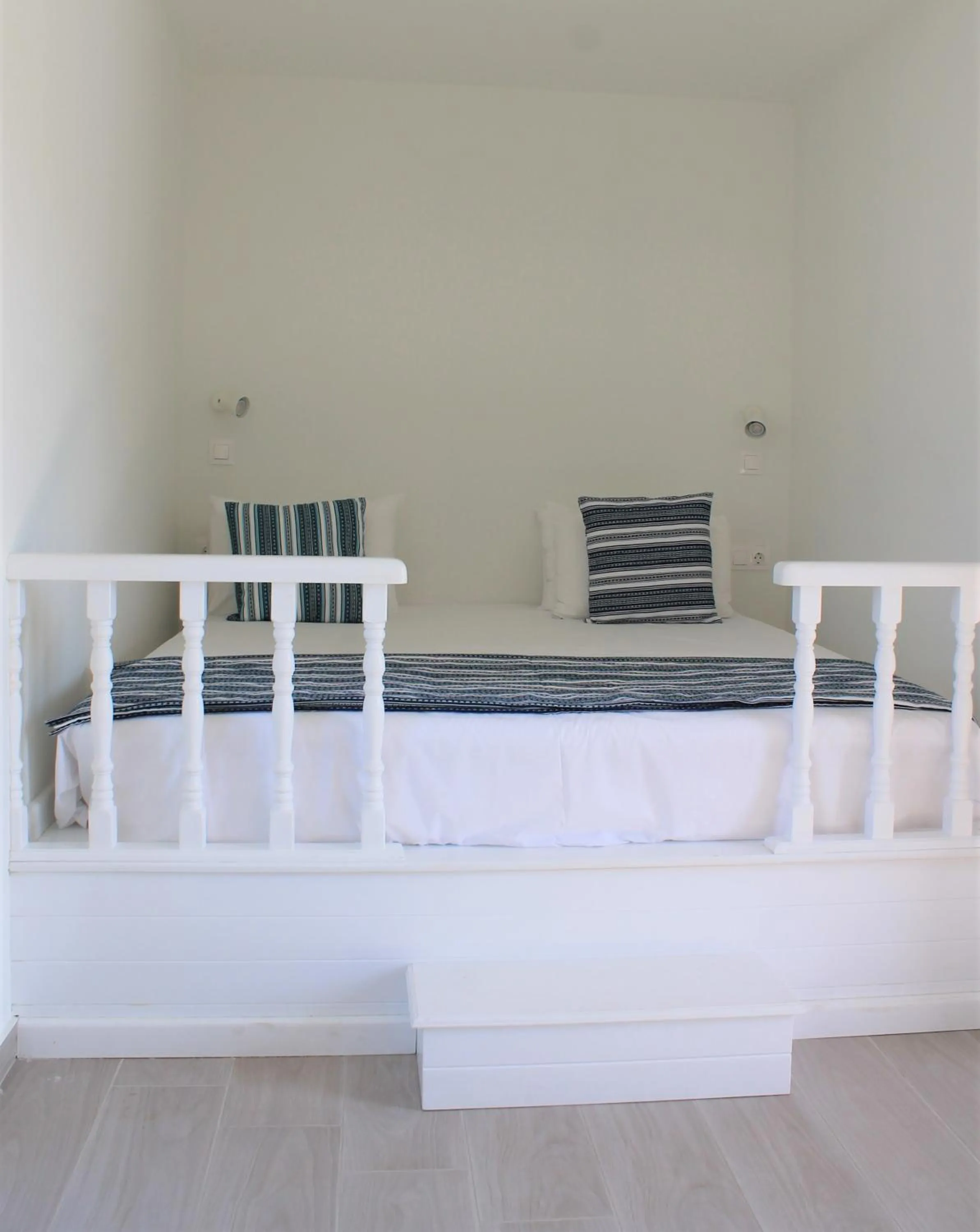 Bed in Stegna Akti Luxury Suites