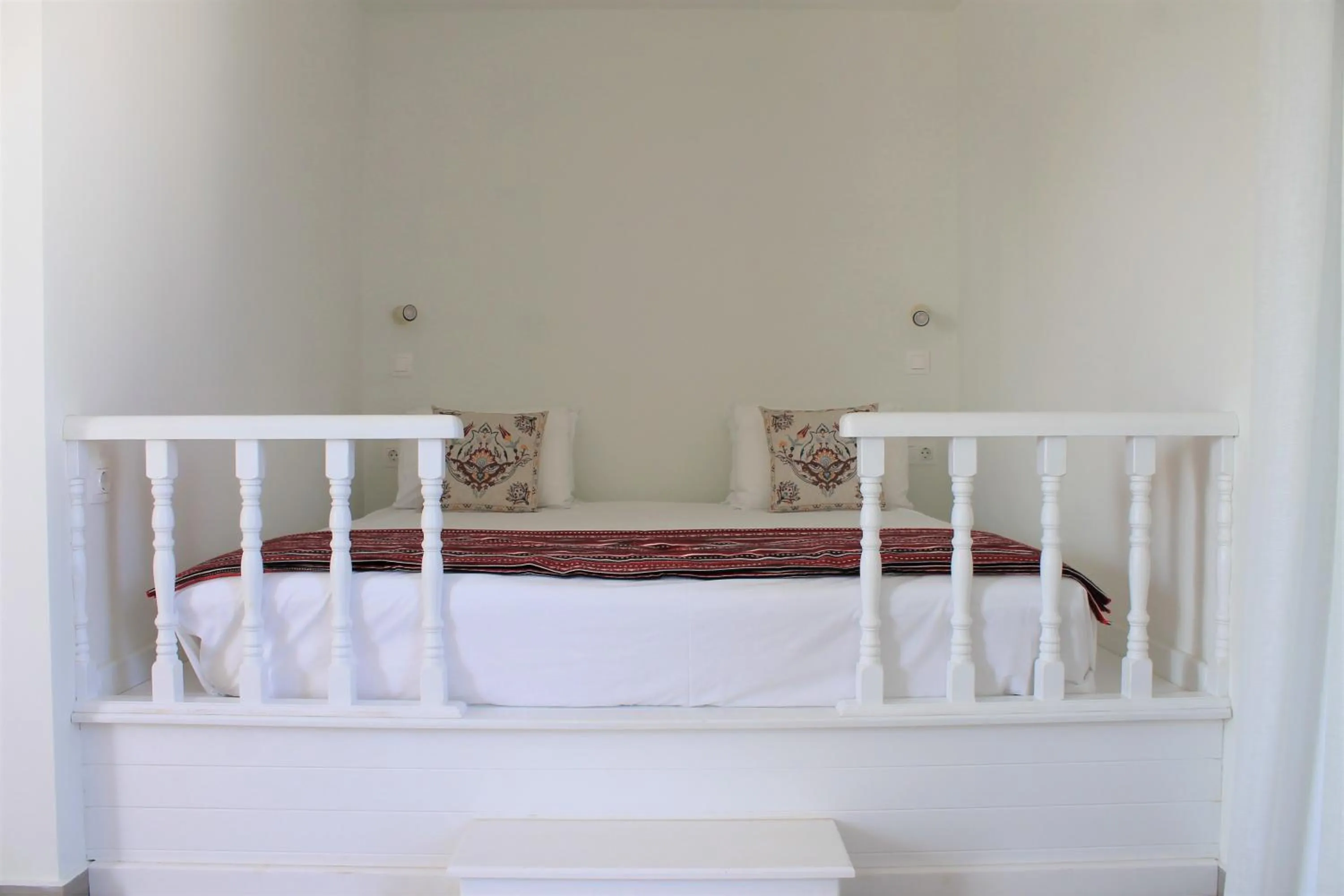 Bed in Stegna Akti Luxury Suites