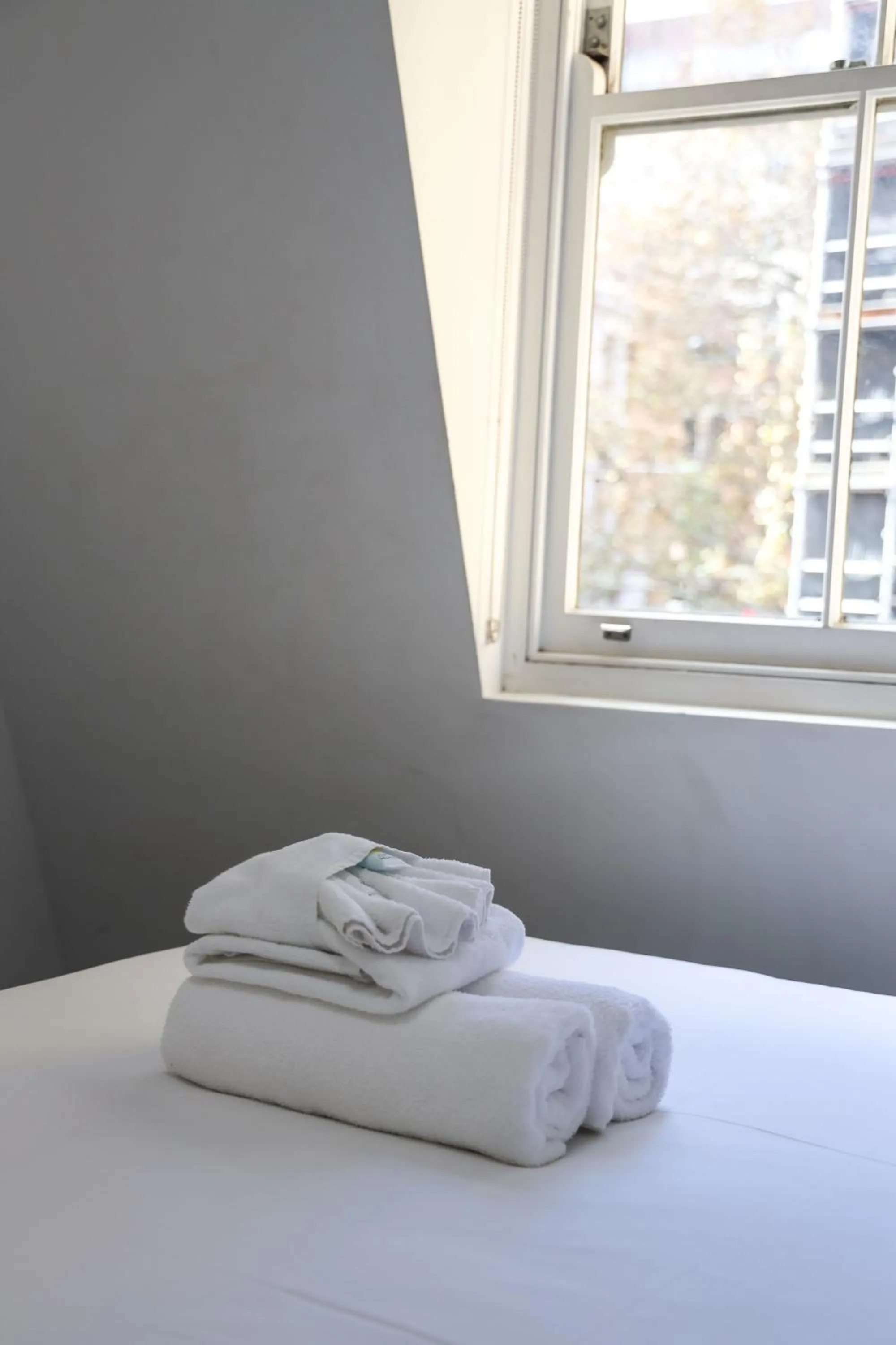 towels, Bed in Base Sydney Hostel