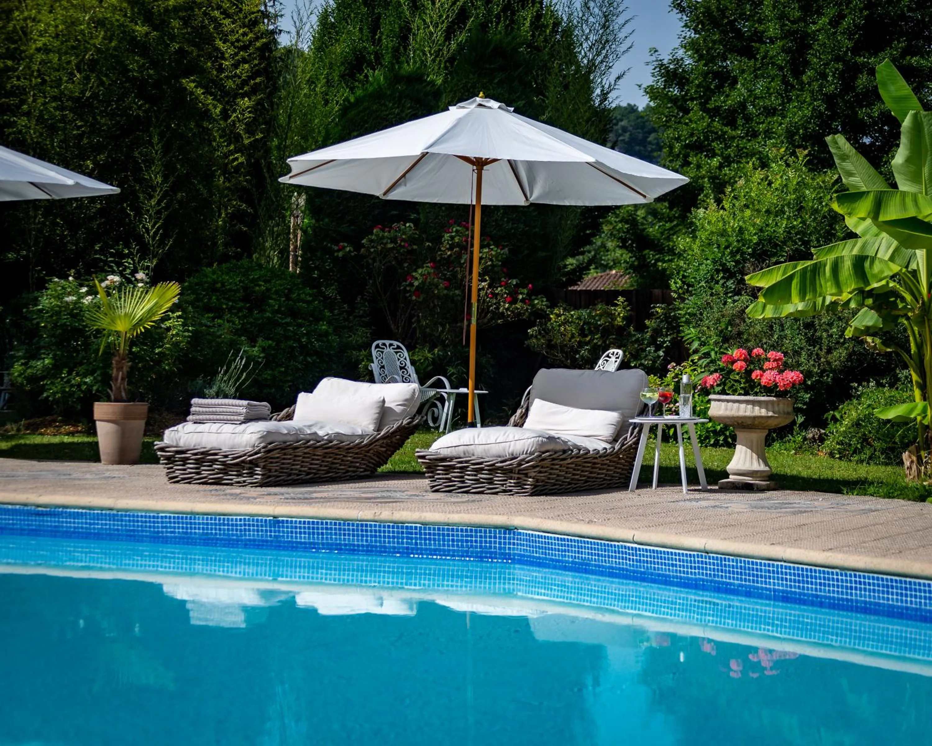 Swimming pool in Hotel Restaurant Le Centenaire