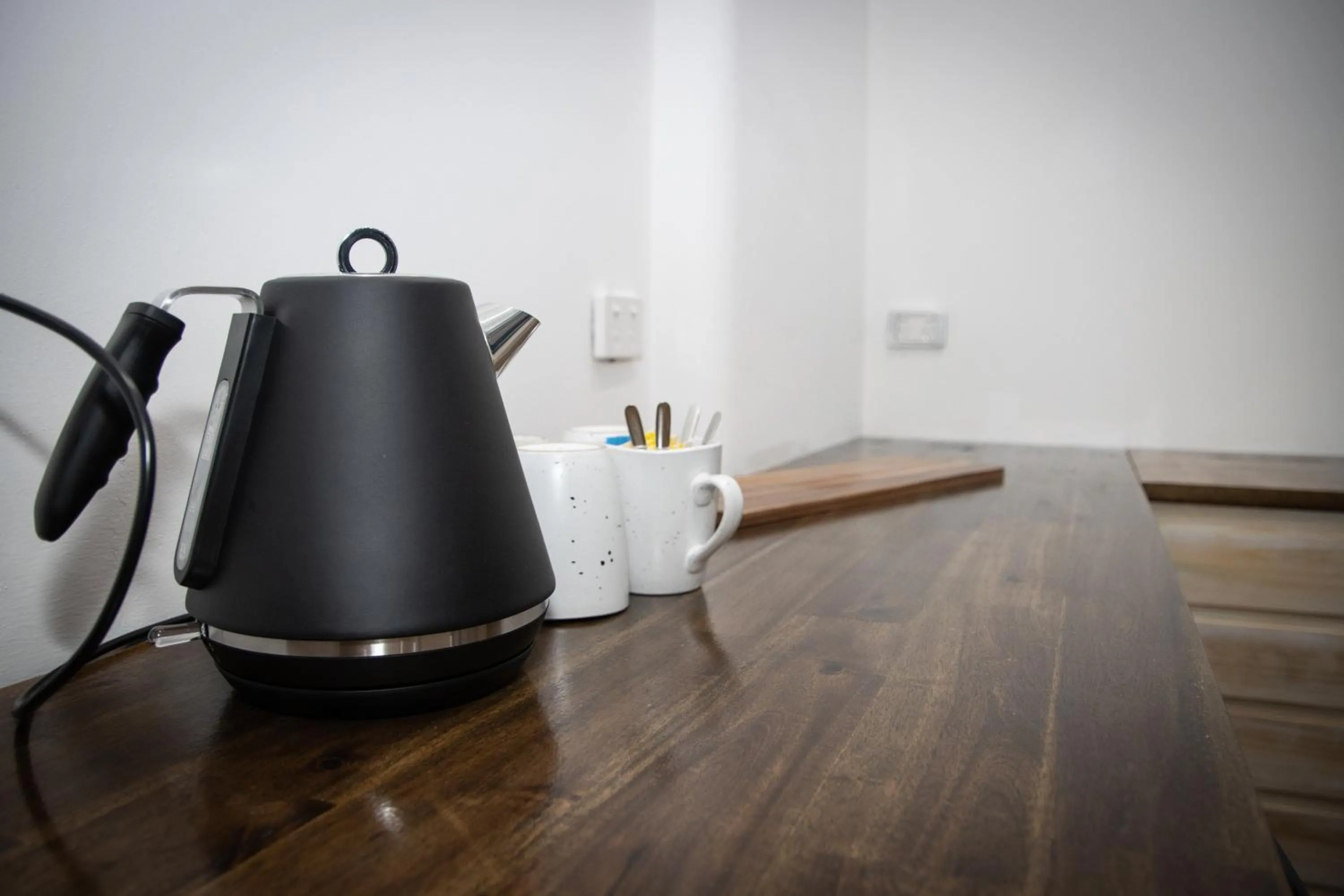 Kitchen or kitchenette in Nomads Brisbane Hostel