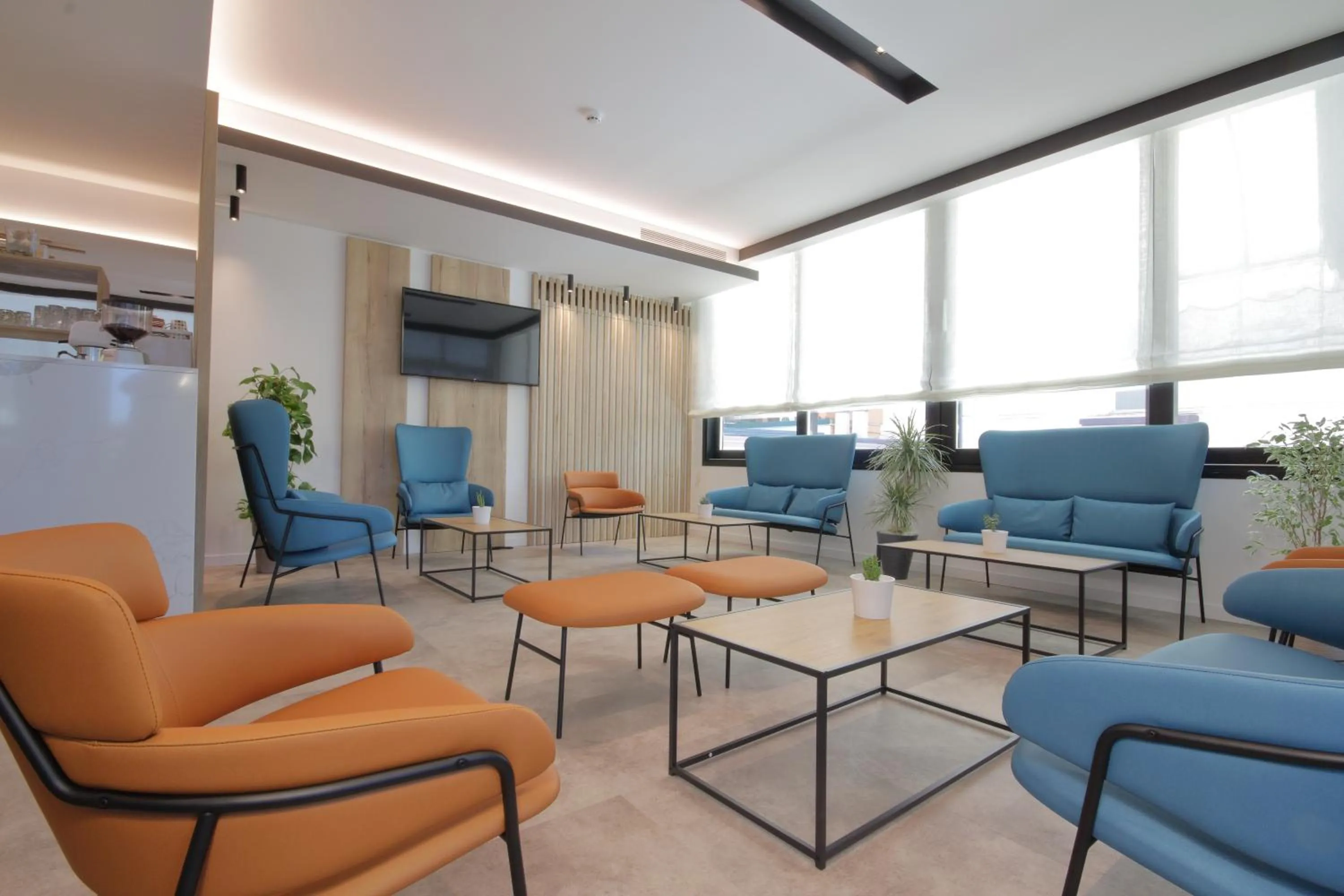 Communal lounge/ TV room in Hotel Toledo