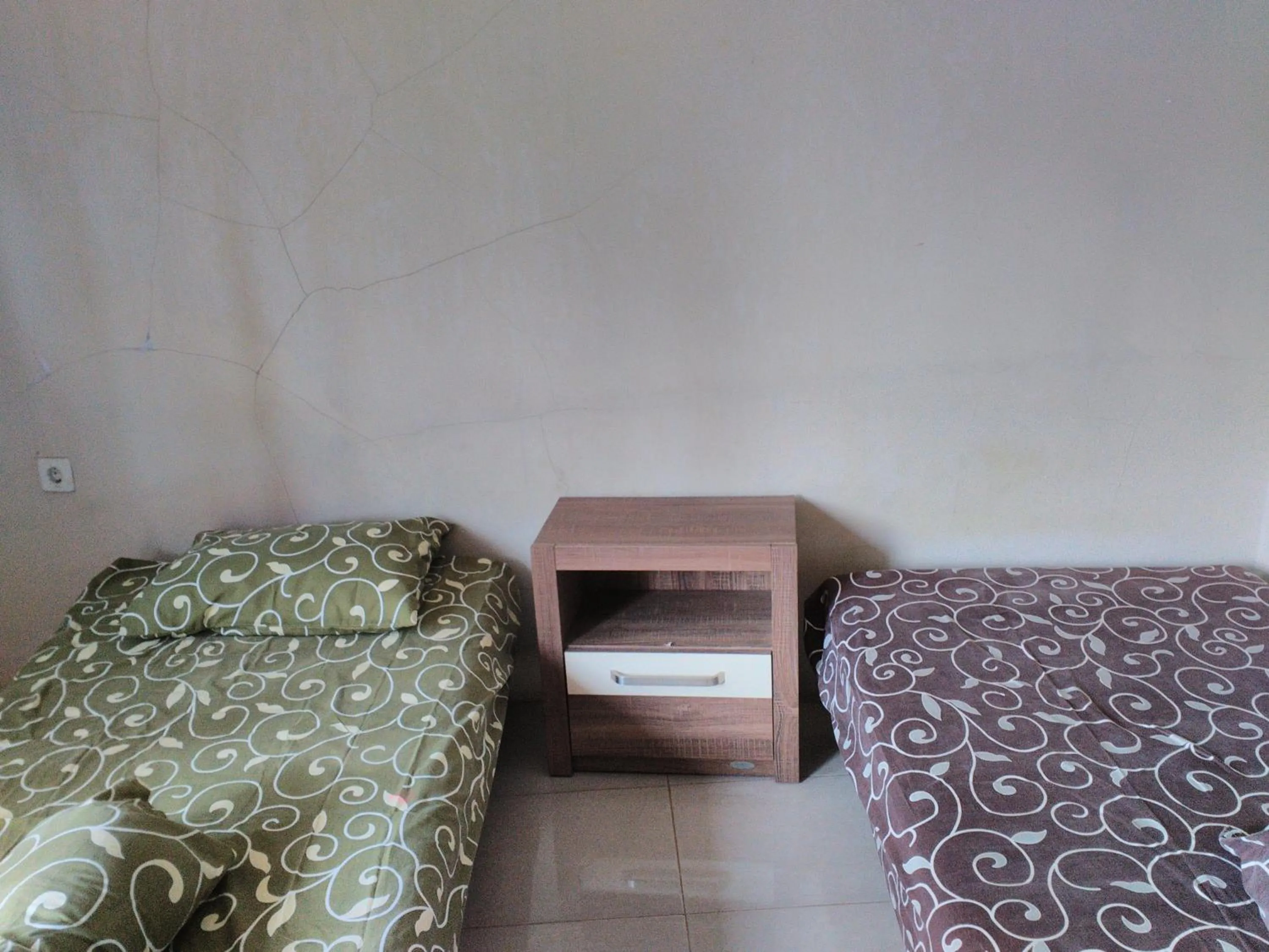 Bed in Nabila Syar'i Guest House