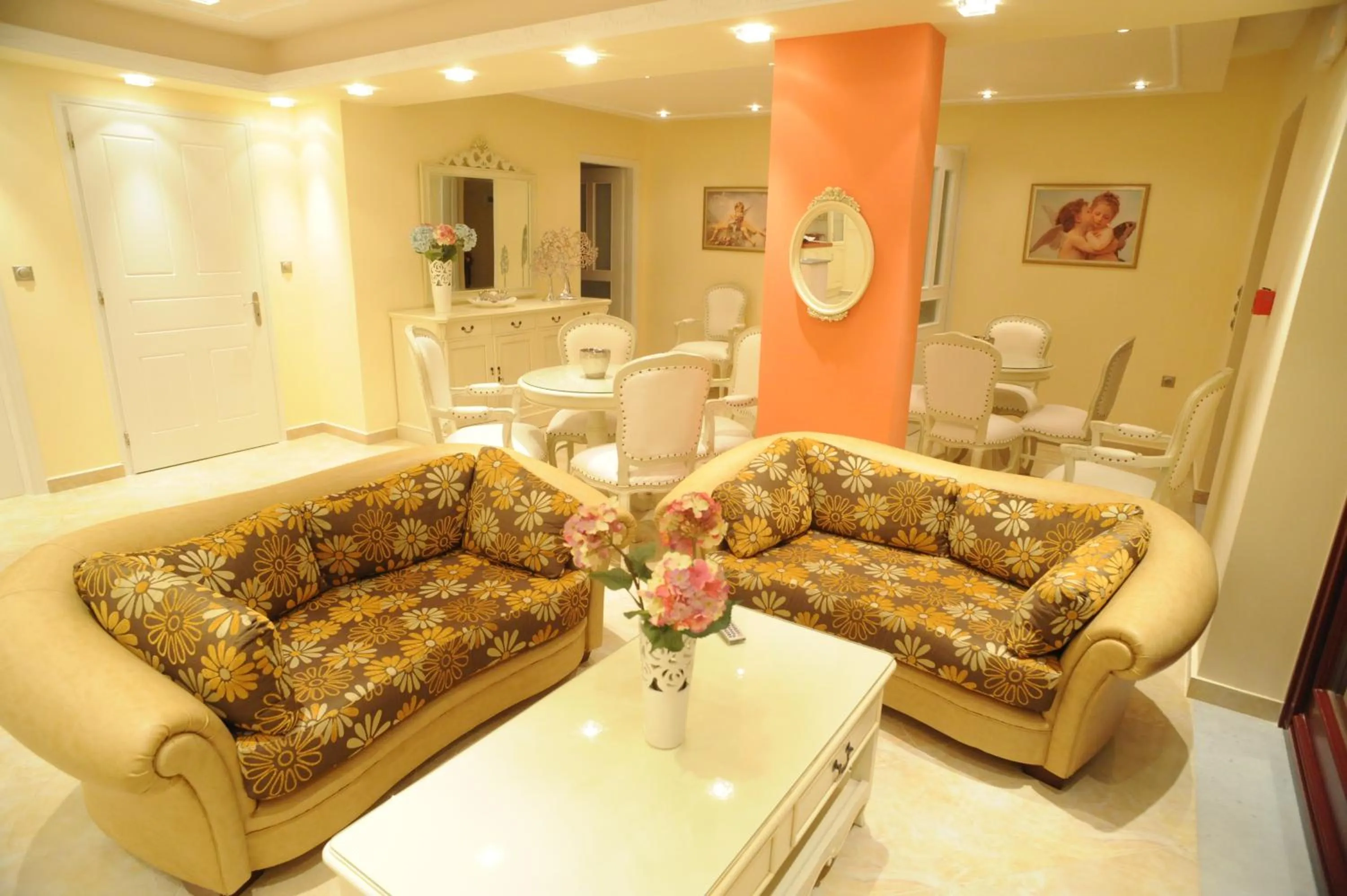 Communal lounge/ TV room in Ariadne Hotel