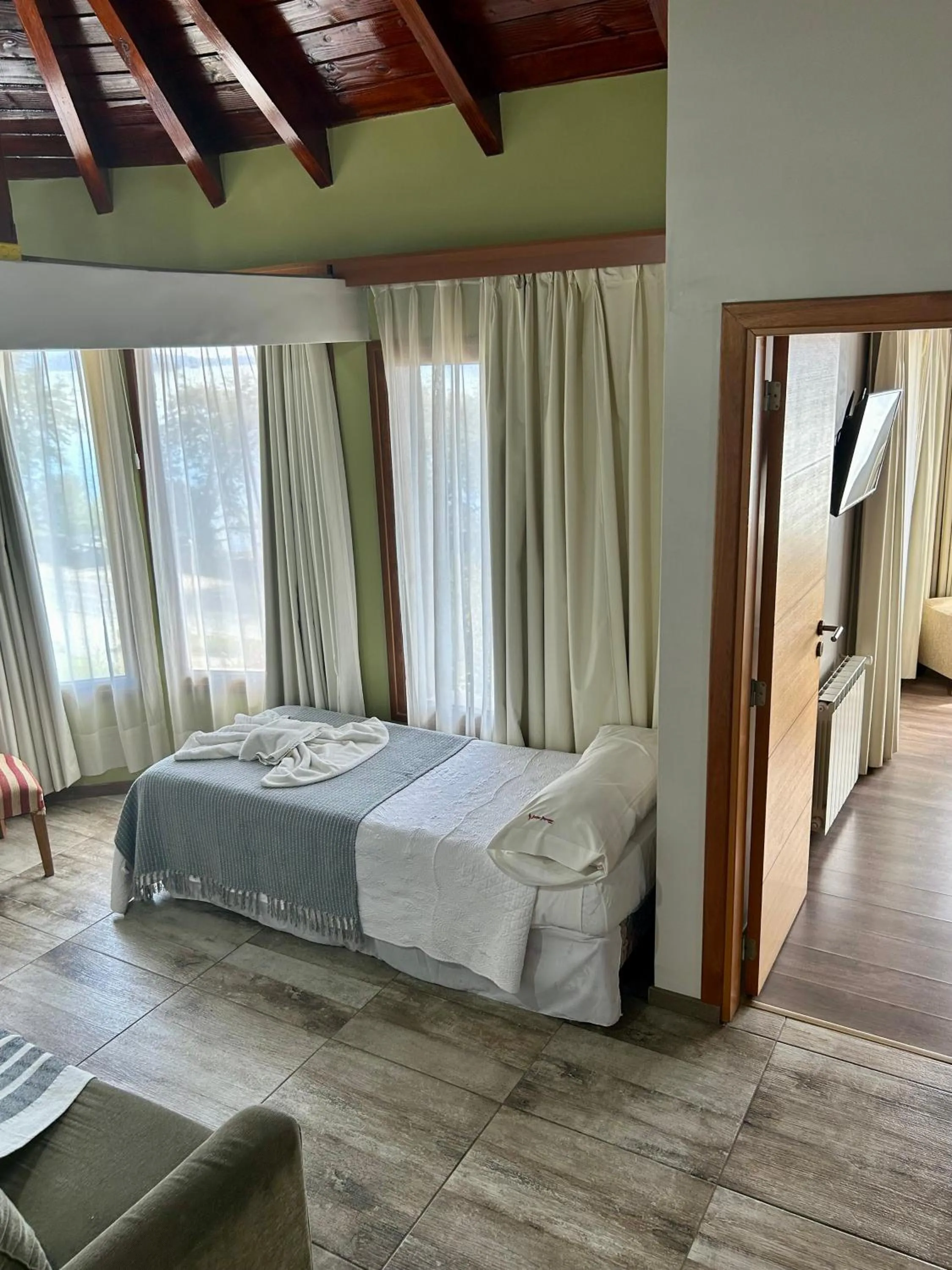 Bed in Bahia Paraiso Apart & Suites