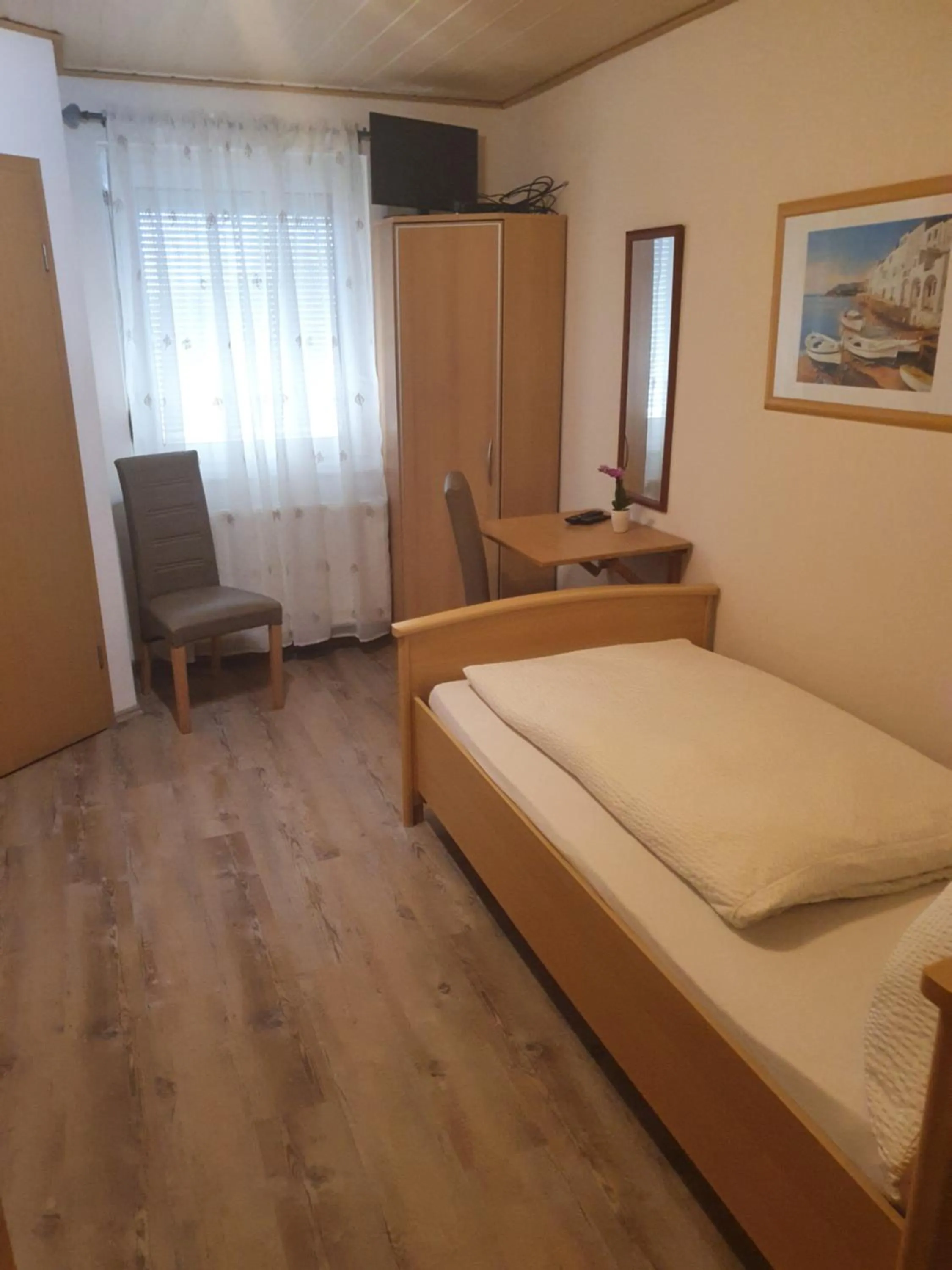 Bed in Restaurant-Hotel Dimitra