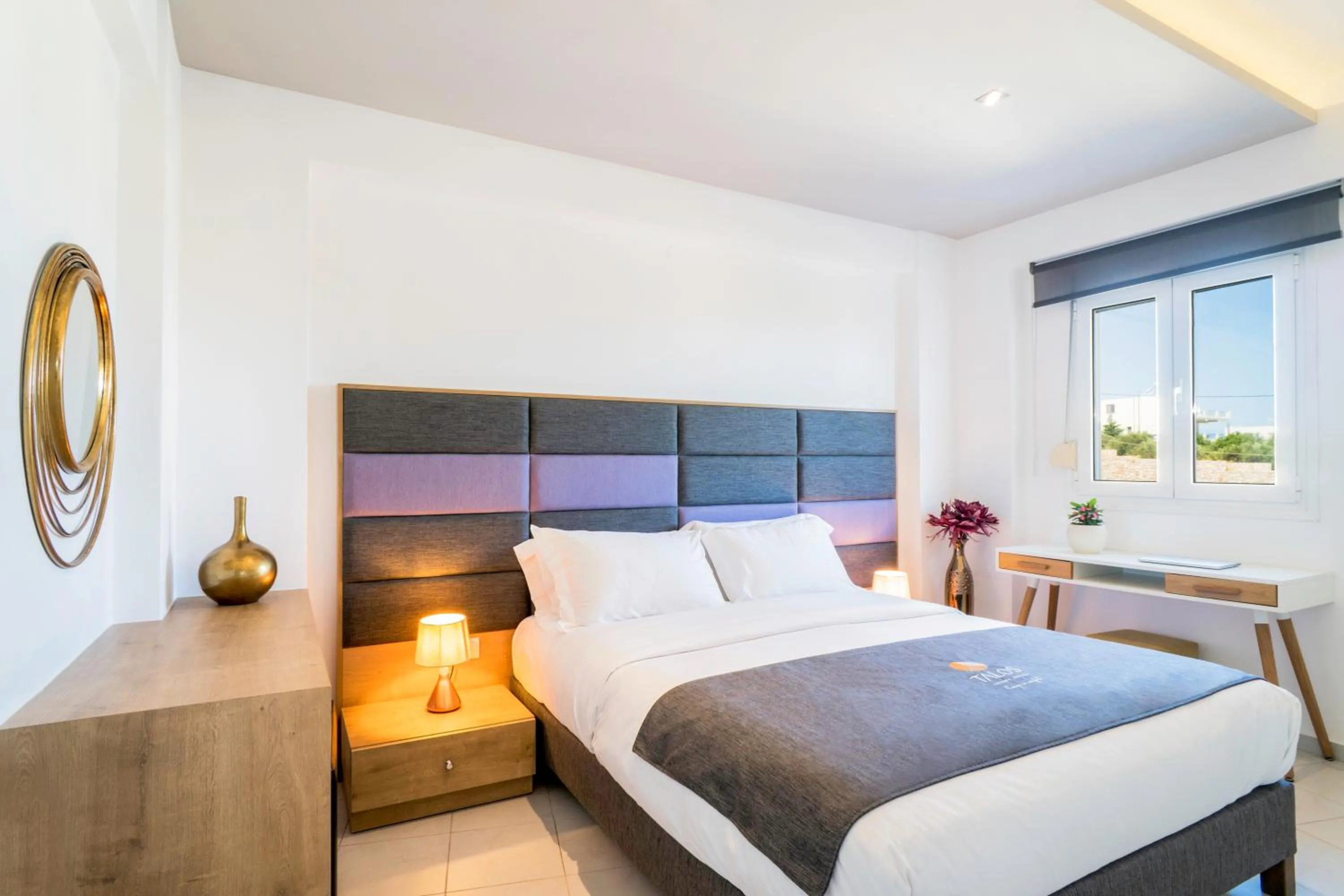 Bed in Talos Luxury Suites