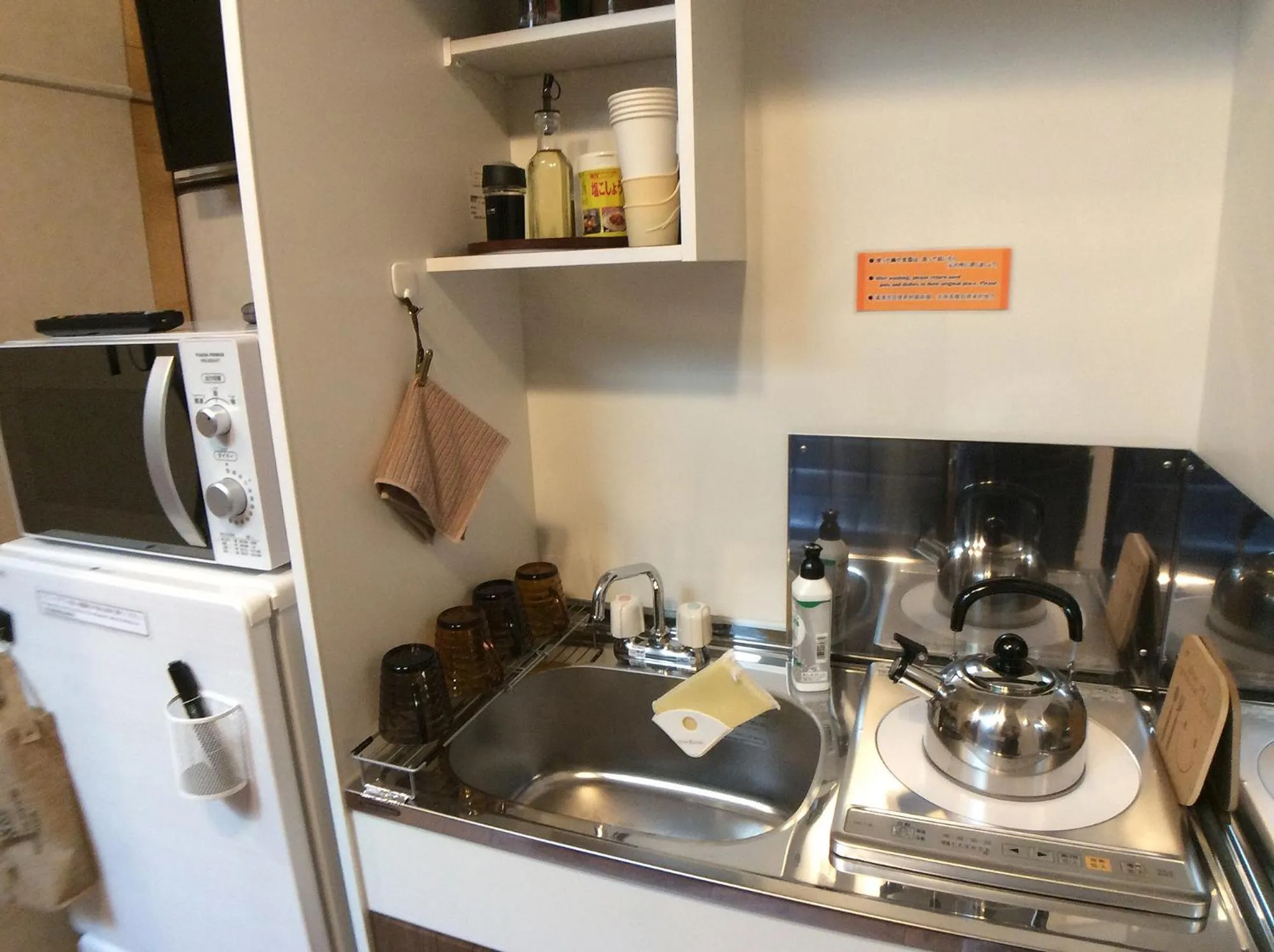 Kitchen or kitchenette in TOMARO Osaka Bay