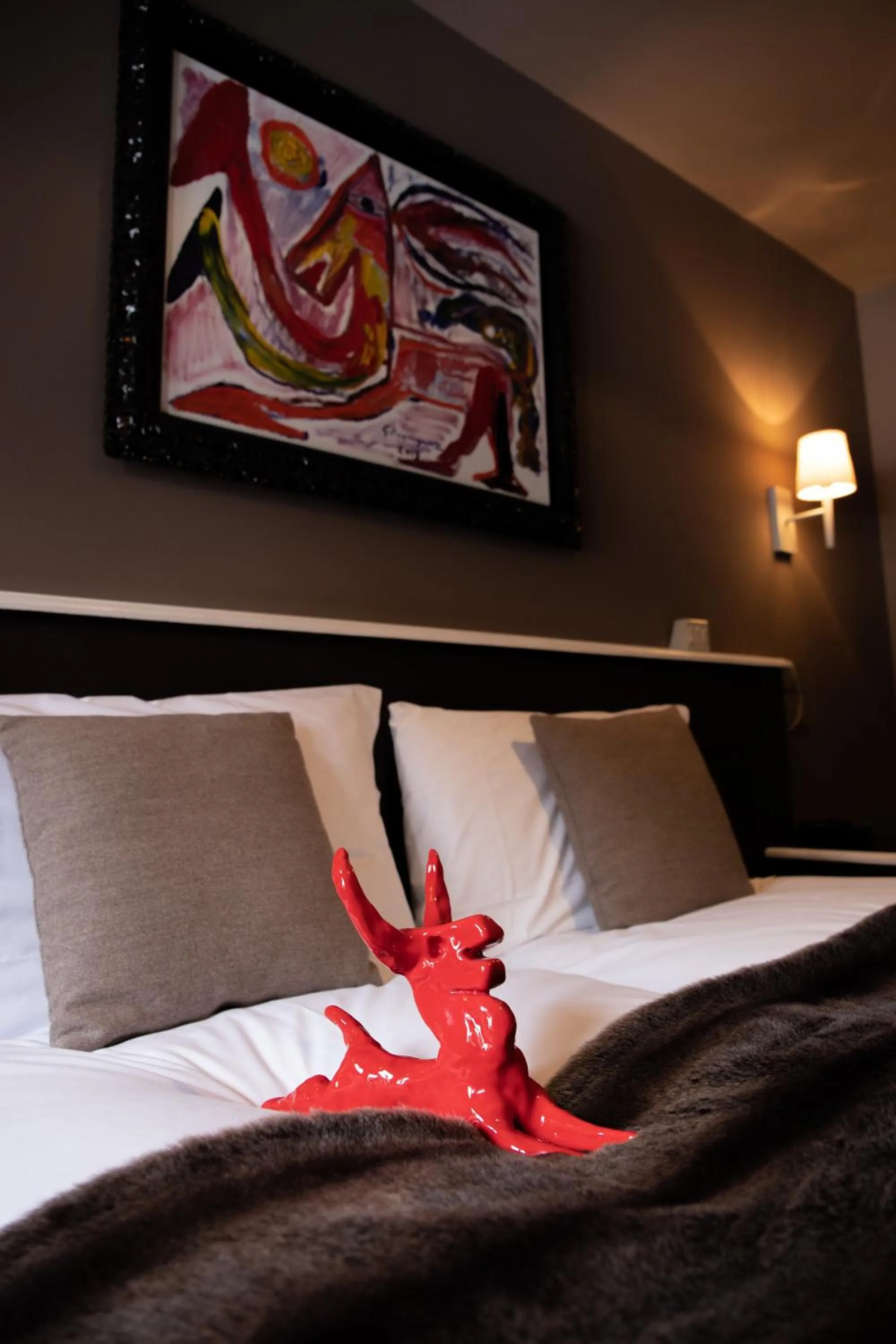 Bed in Art Hotel Grivola