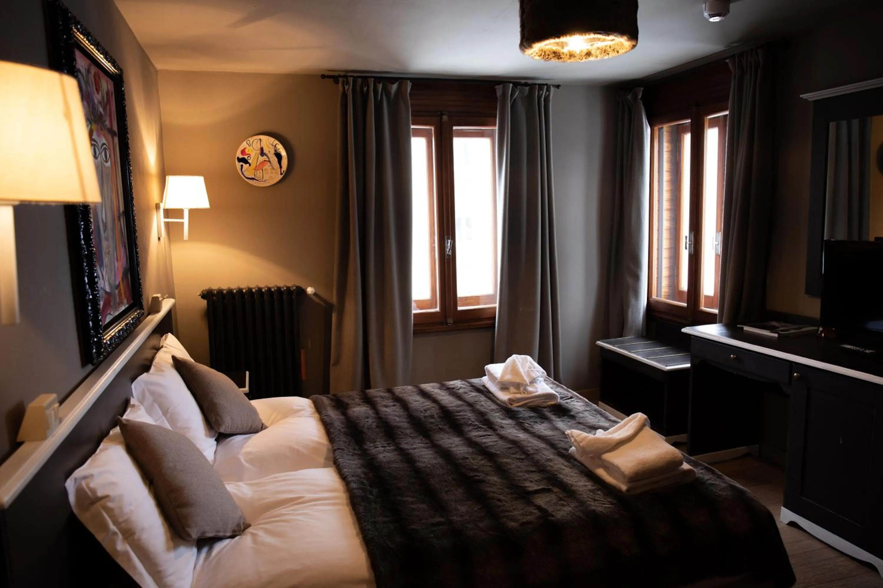 Bed in Art Hotel Grivola