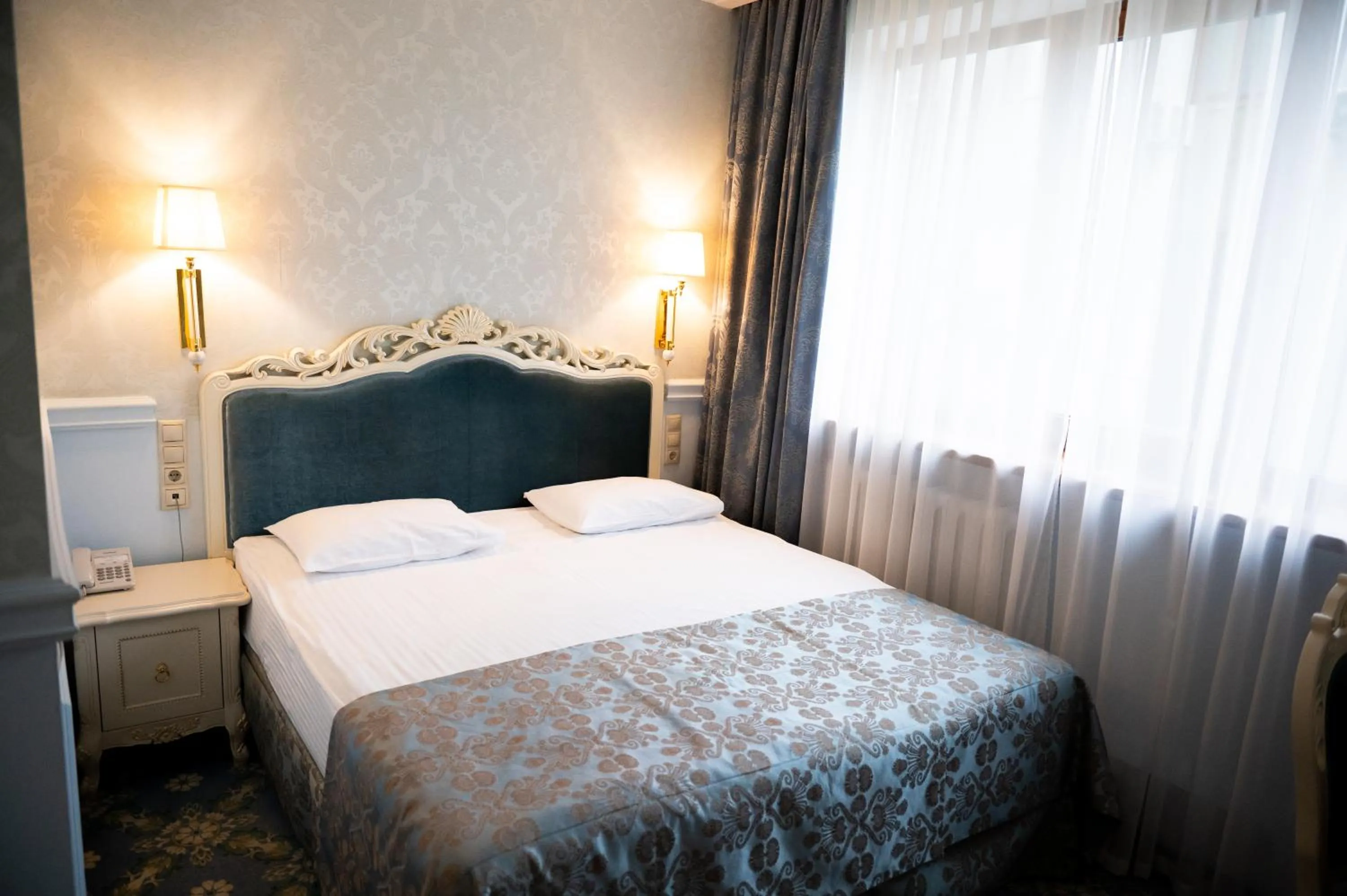 Bed in Olympic Hotel