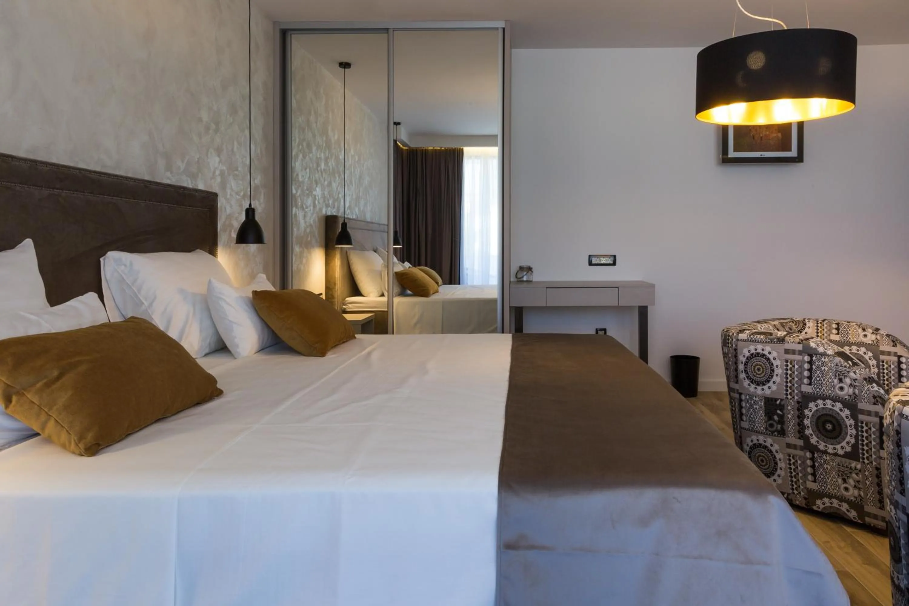 Deluxe King Room with Balcony - single occupancy in Mirabilis Residence