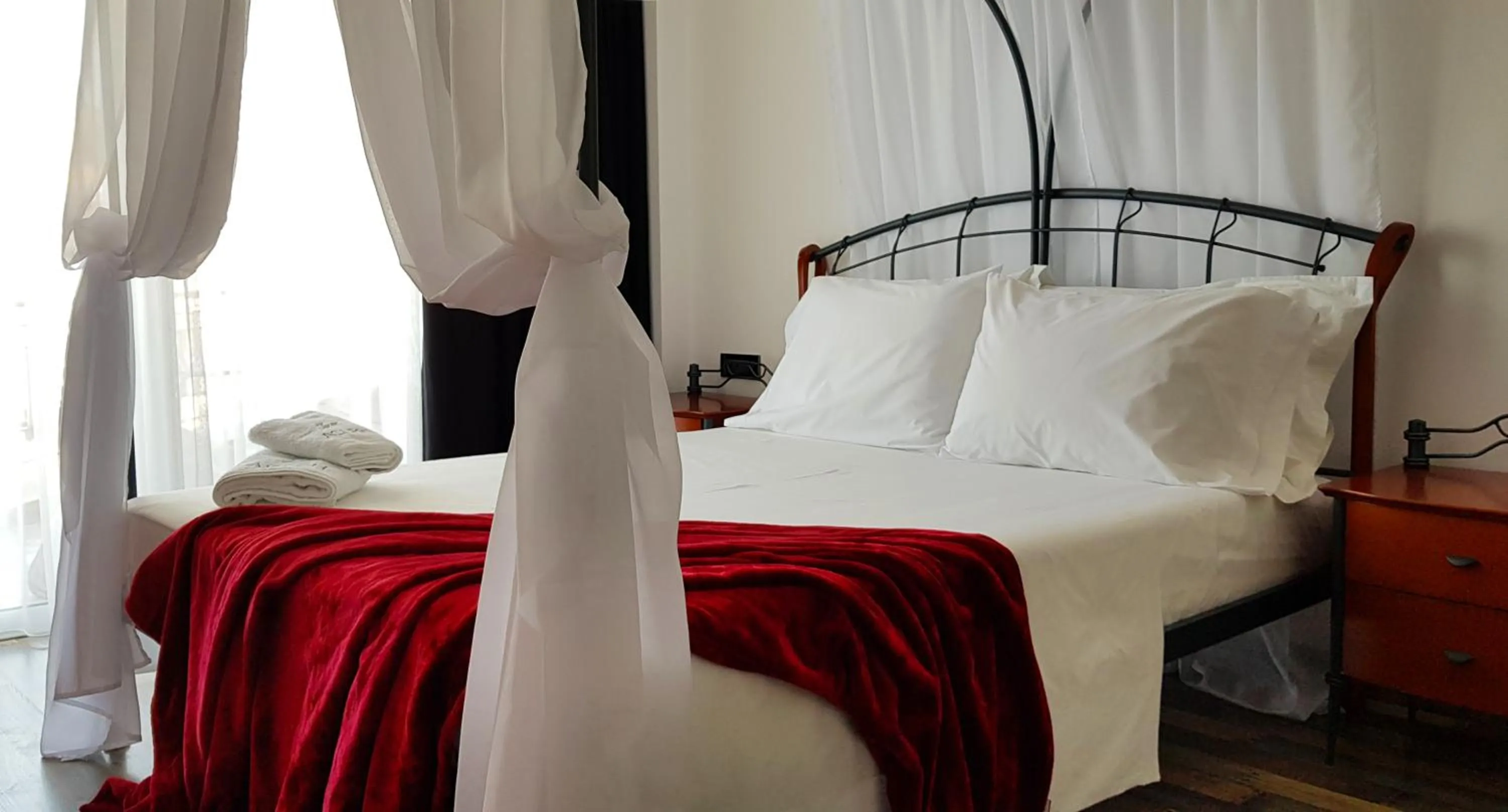 Bed in Asi Rooftop Hotel