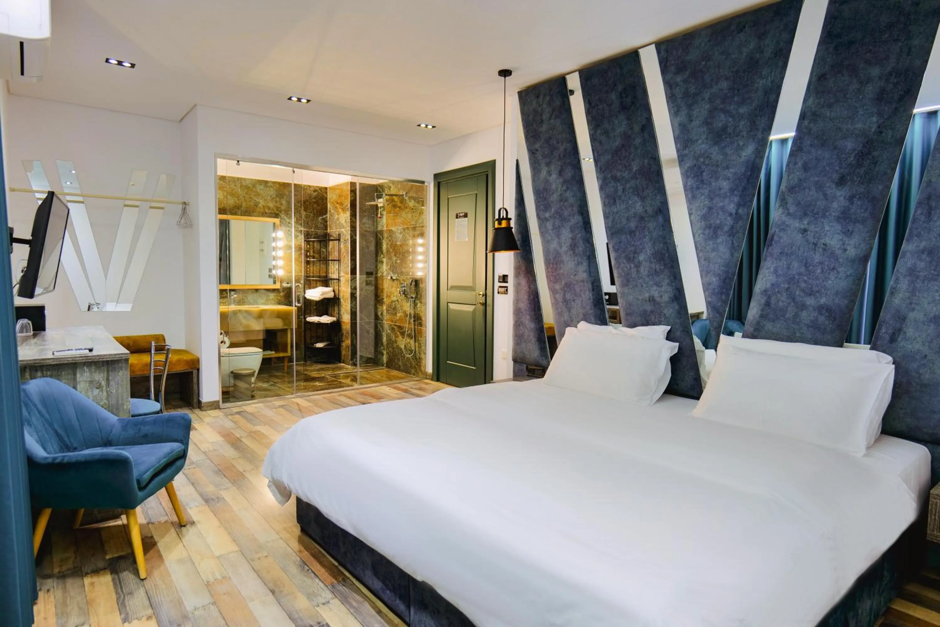 Bed in Asi Rooftop Hotel