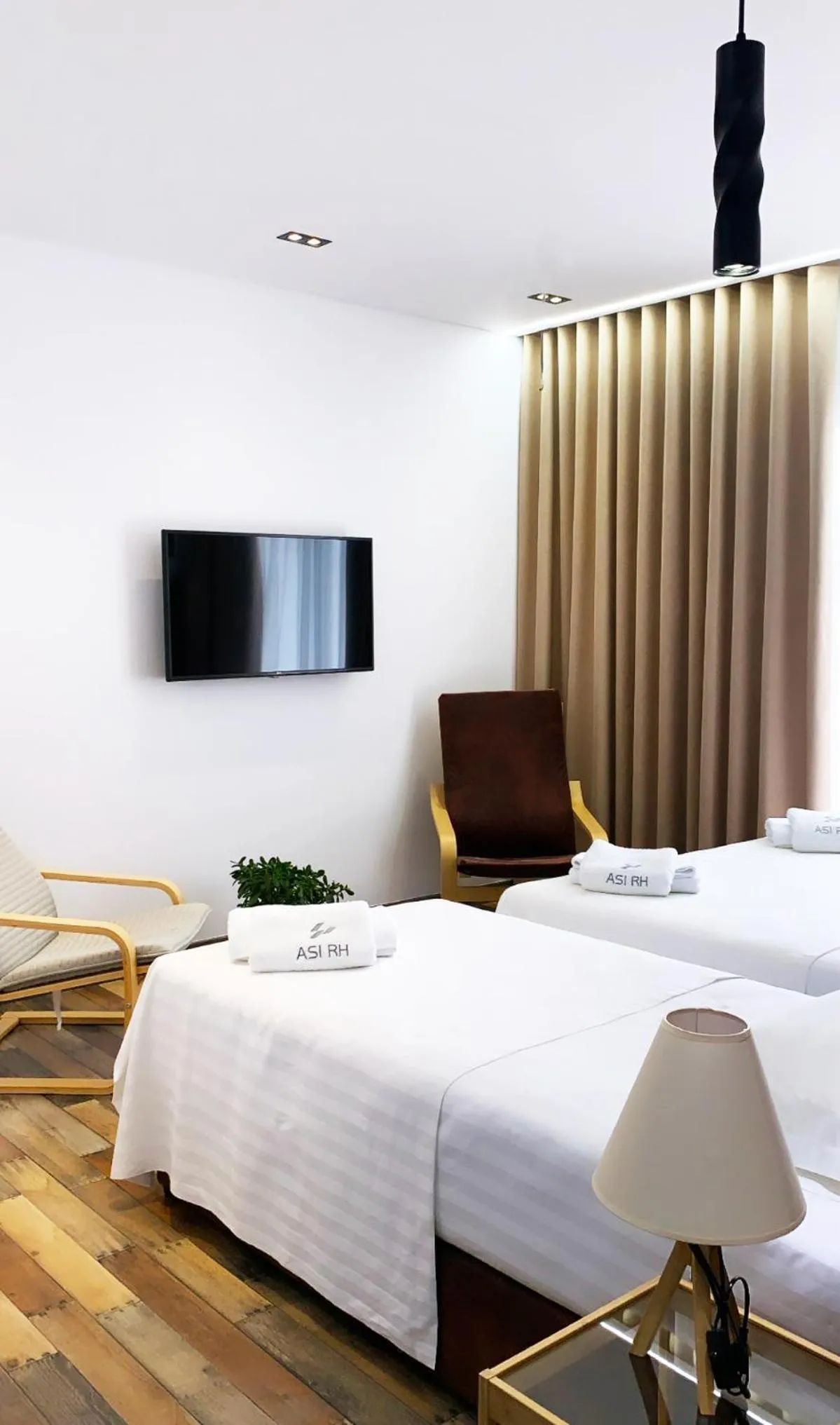 Bed in Asi Rooftop Hotel