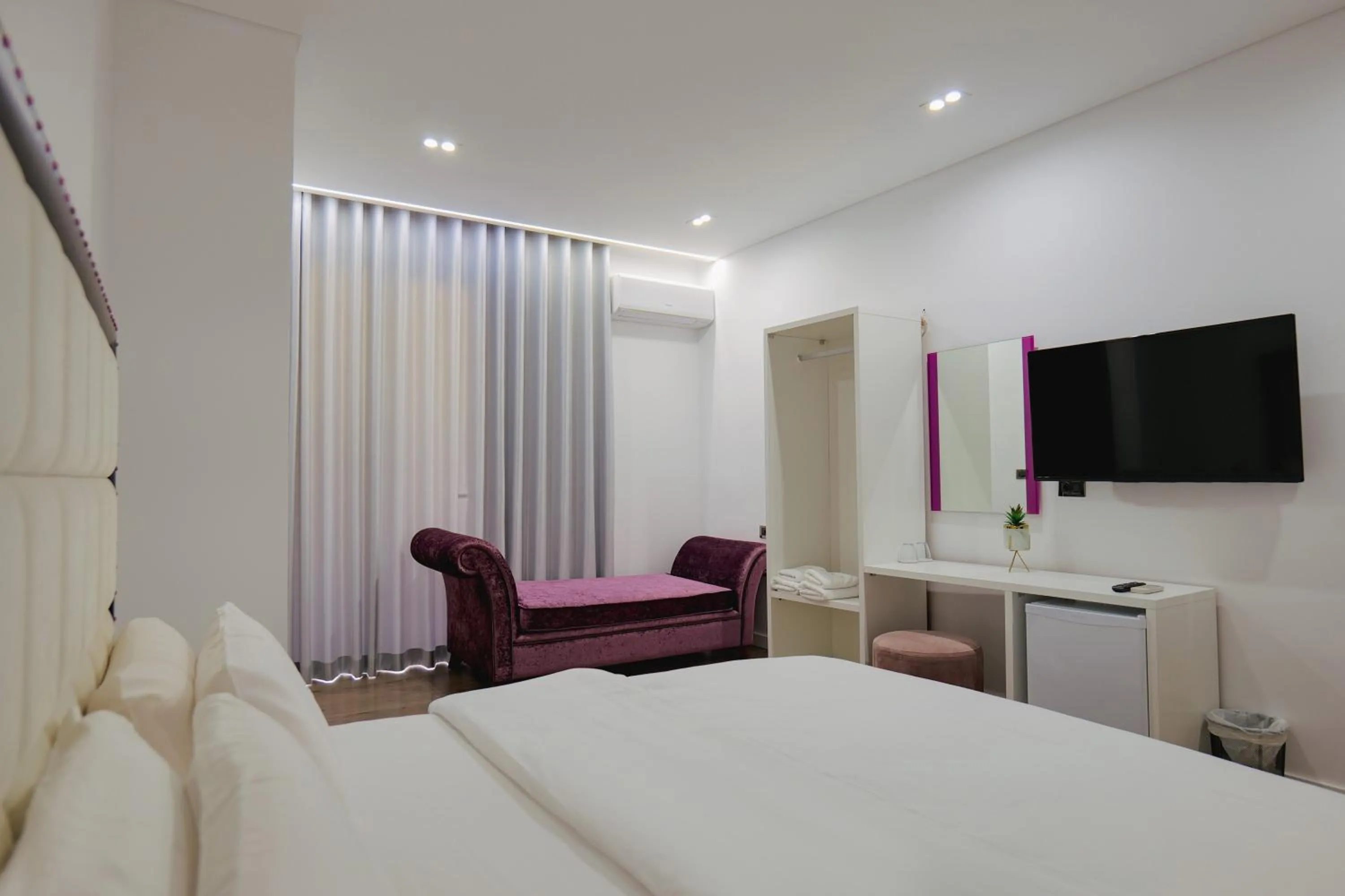 Bed in Asi Rooftop Hotel