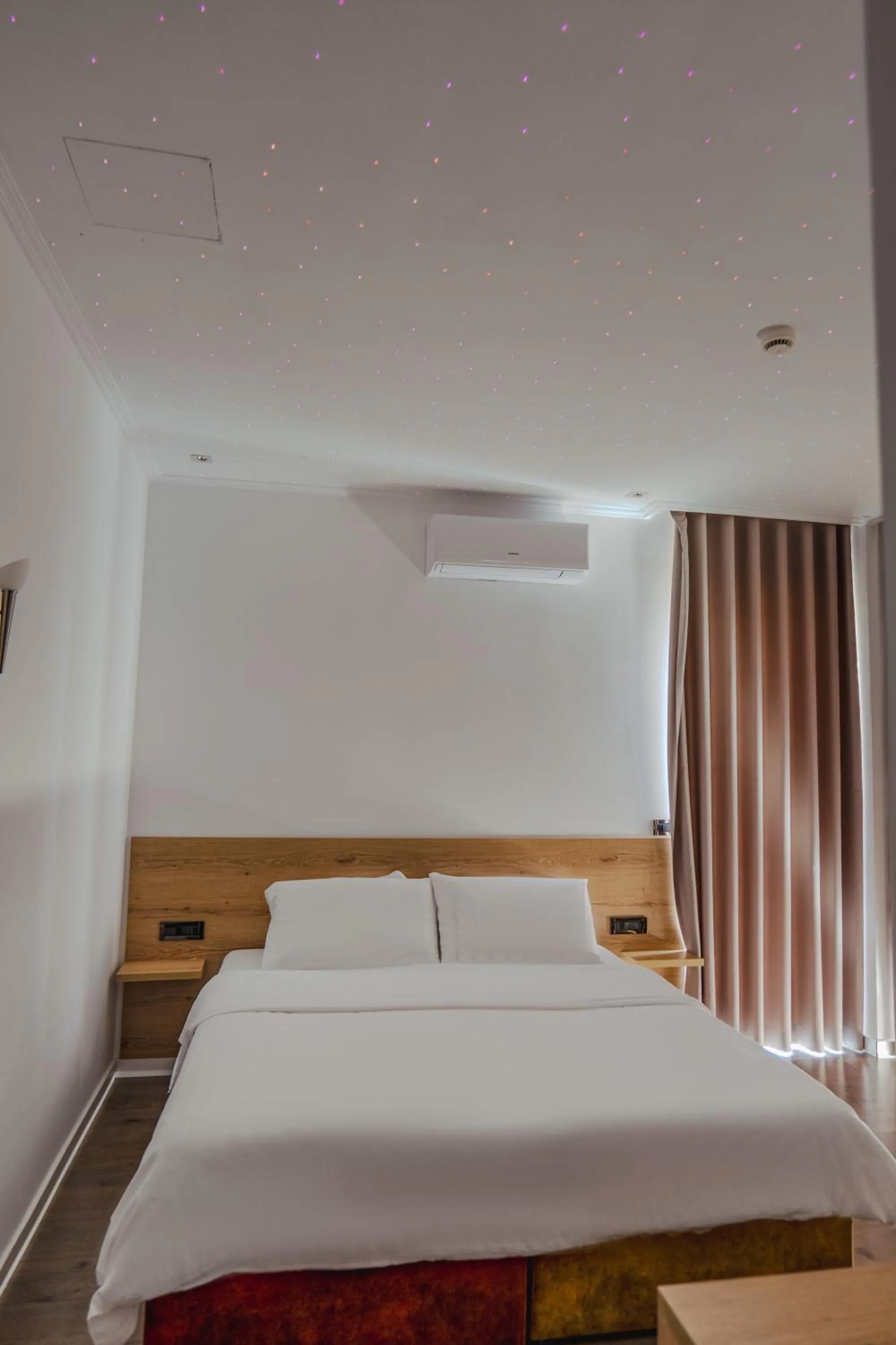 Bed in Asi Rooftop Hotel