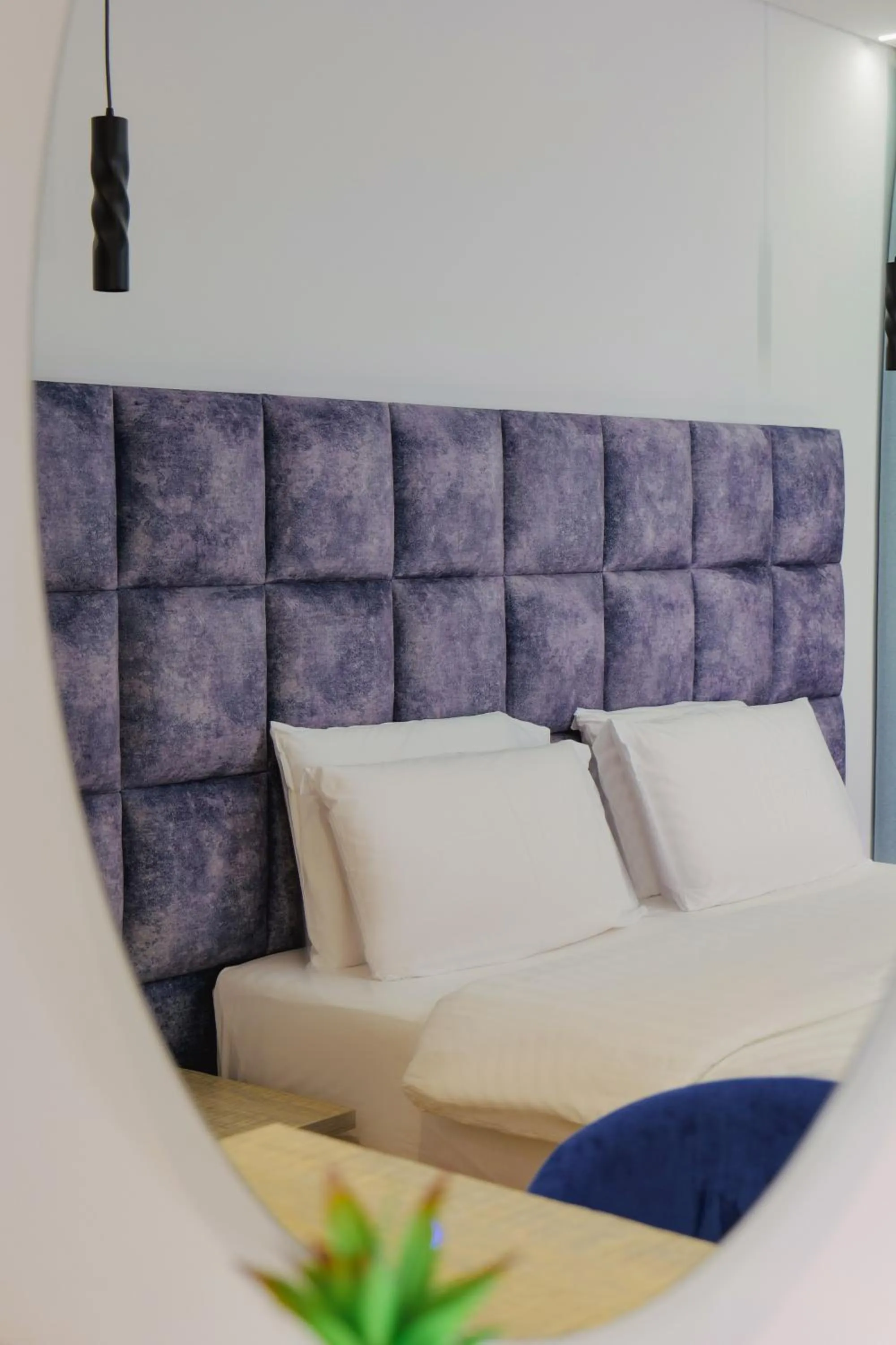 Bed in Asi Rooftop Hotel